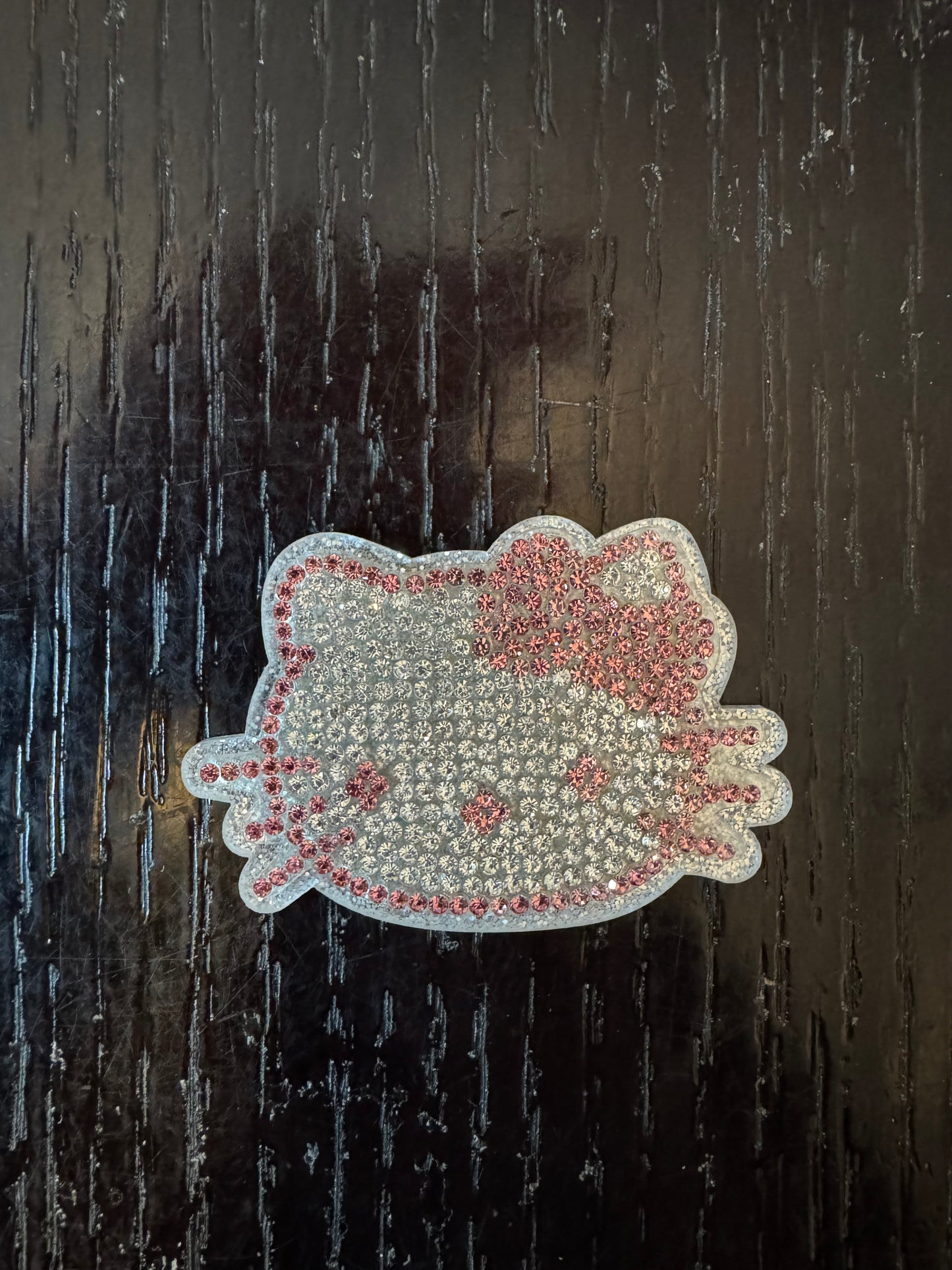Hello kitty rhinestone head badge reel