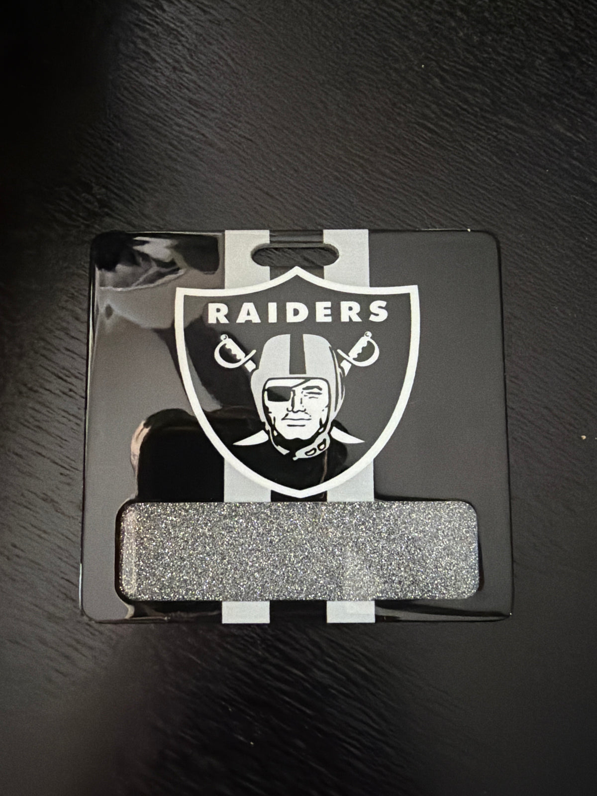 Raiders badge buddy