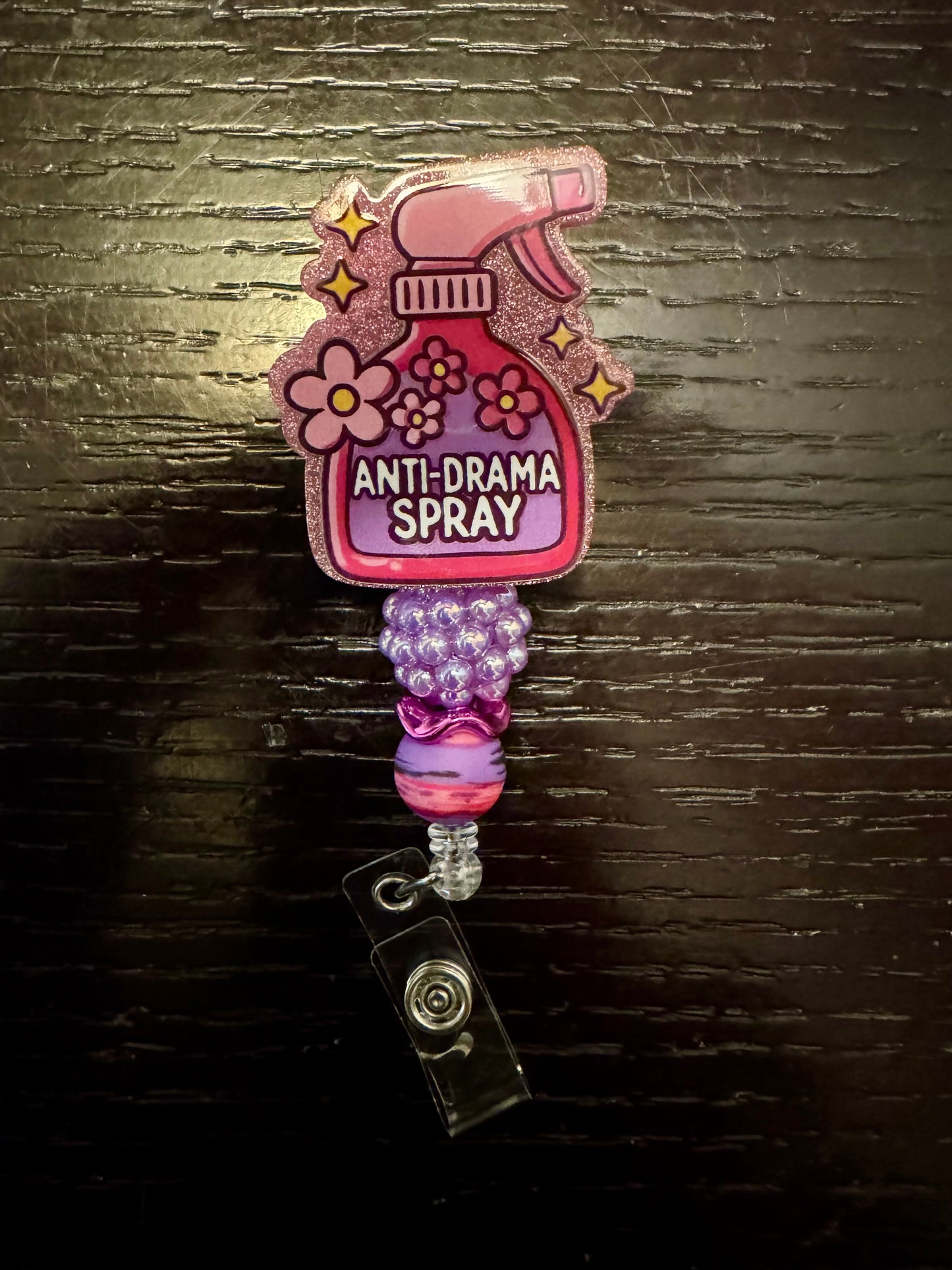 Anti Drama spray badge reel
