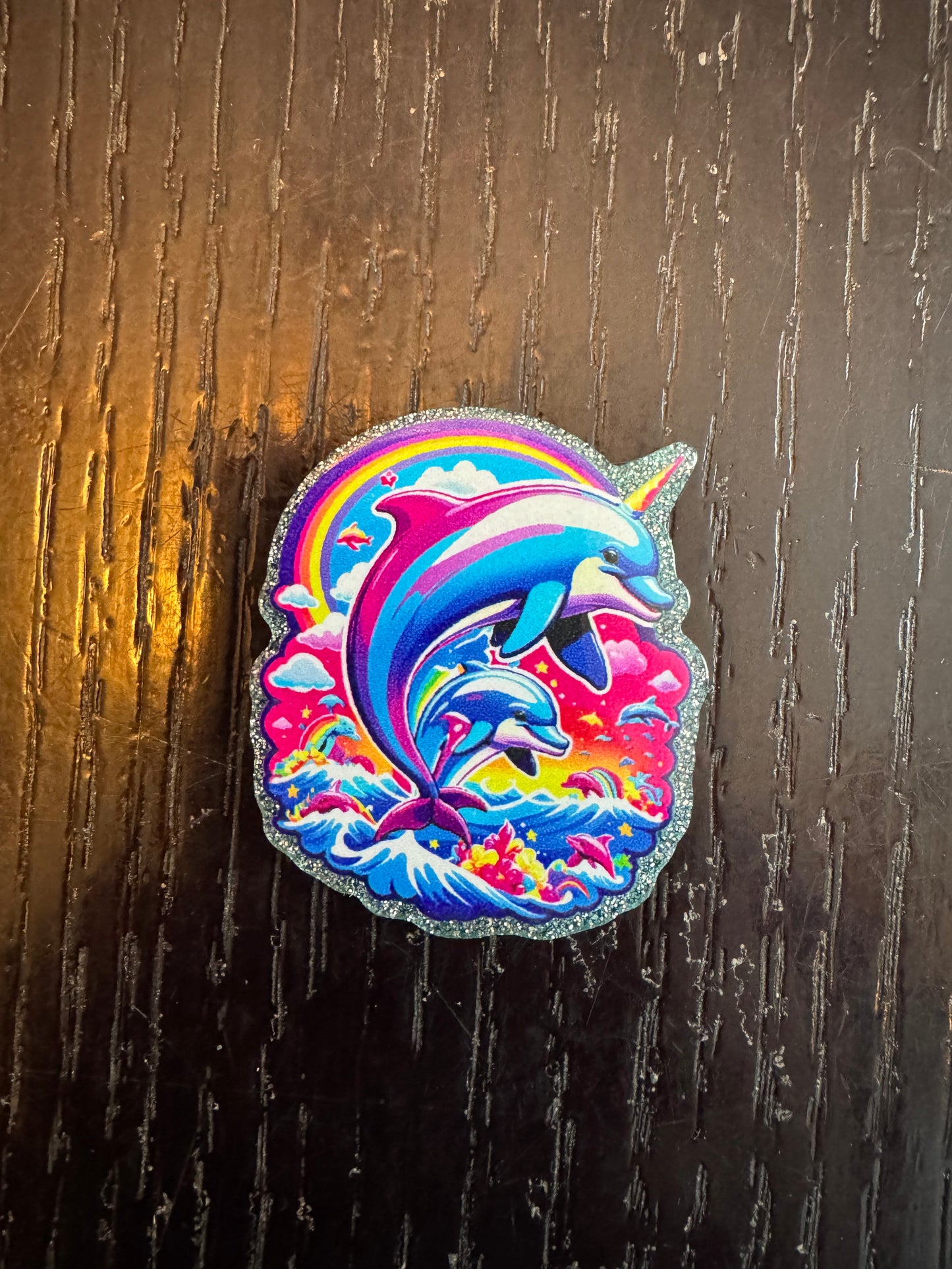 Lisa Frank dolphin badge reel