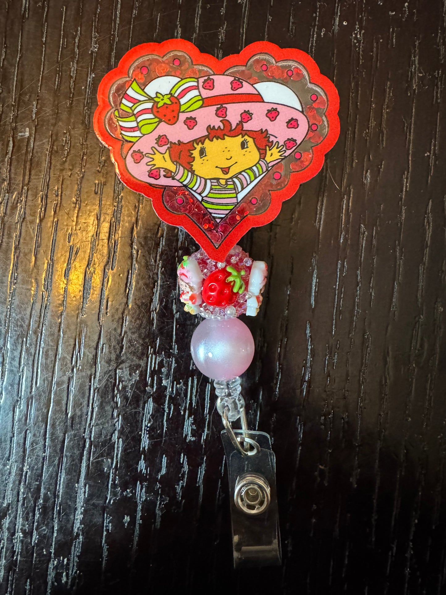 Strawberry shortcake shaker badge reel