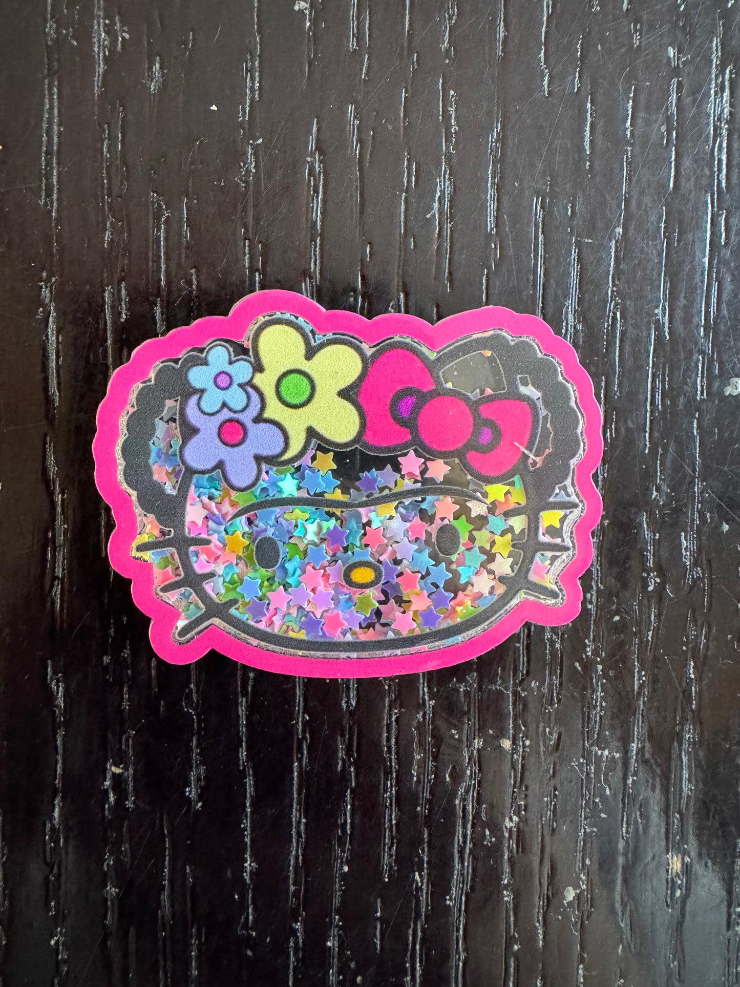 Hello Kitty shaker badge reel