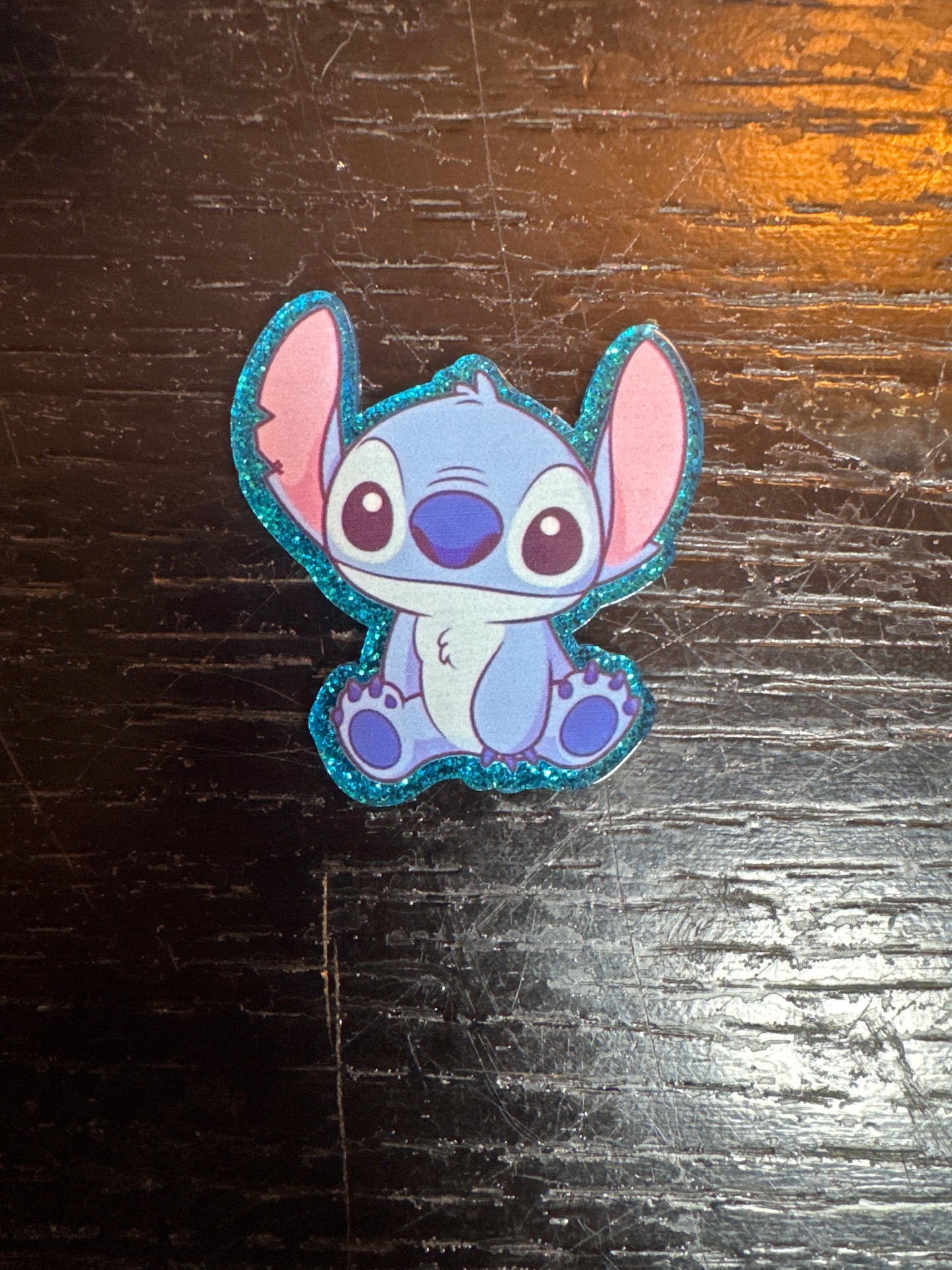 Stitch badge reel