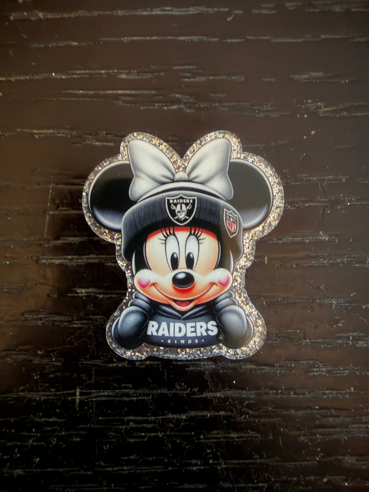 Raiders Minnie badge reel