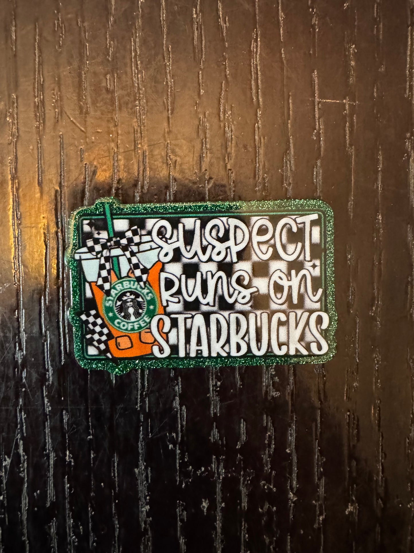 Suspect runs on Starbucks badge reel