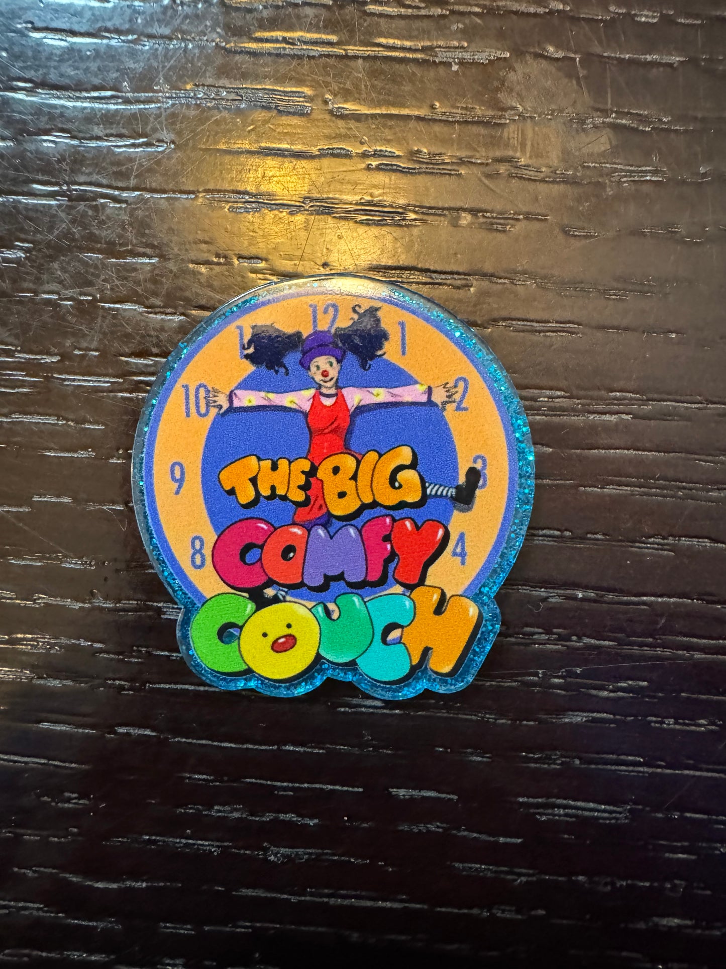 Big comfy couch badge reel