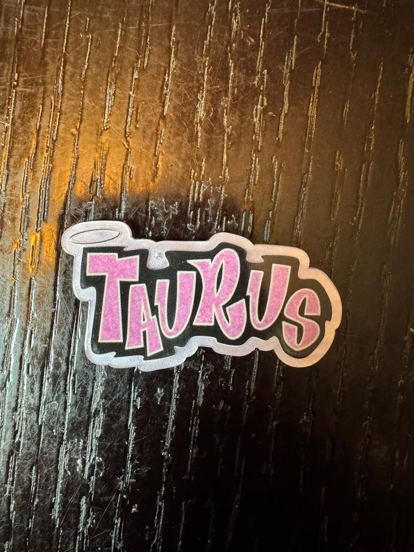Taurus badge reel