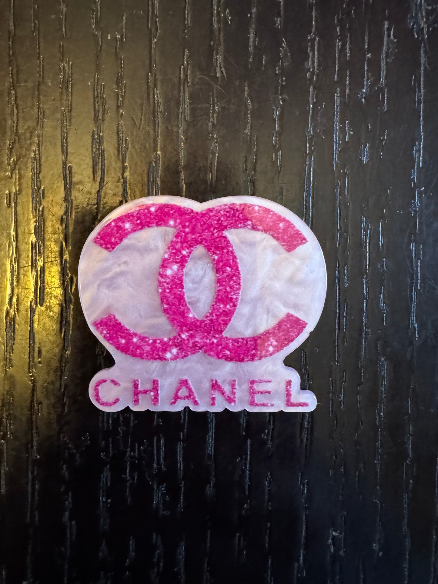 Chanel badge reel