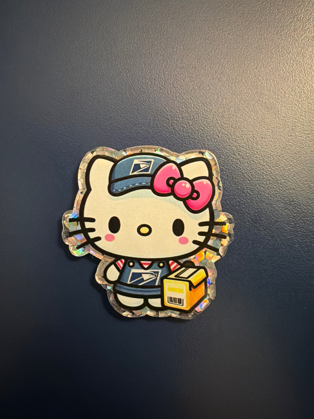 Postal Service Hello Kitty badge reel