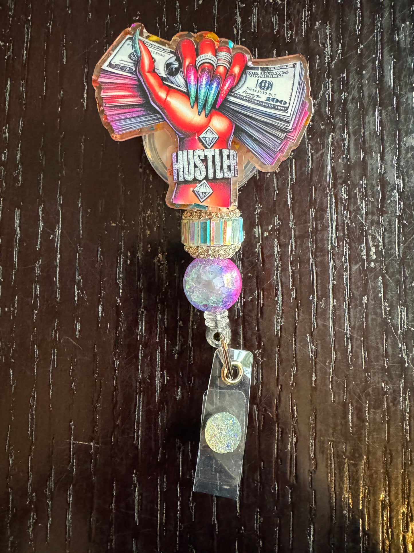 Hustler badge reel