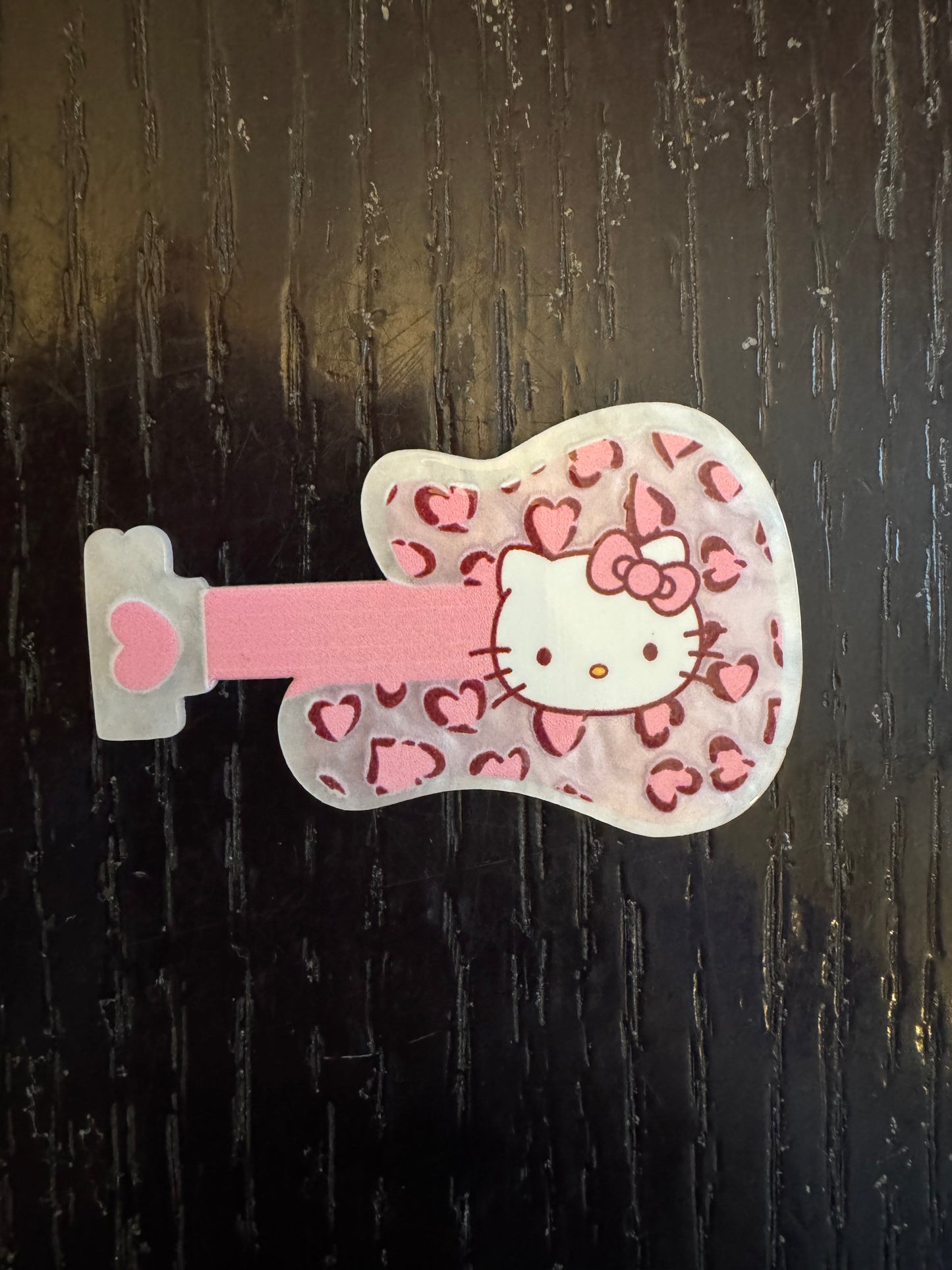 Hello Kitty guitar badge reel