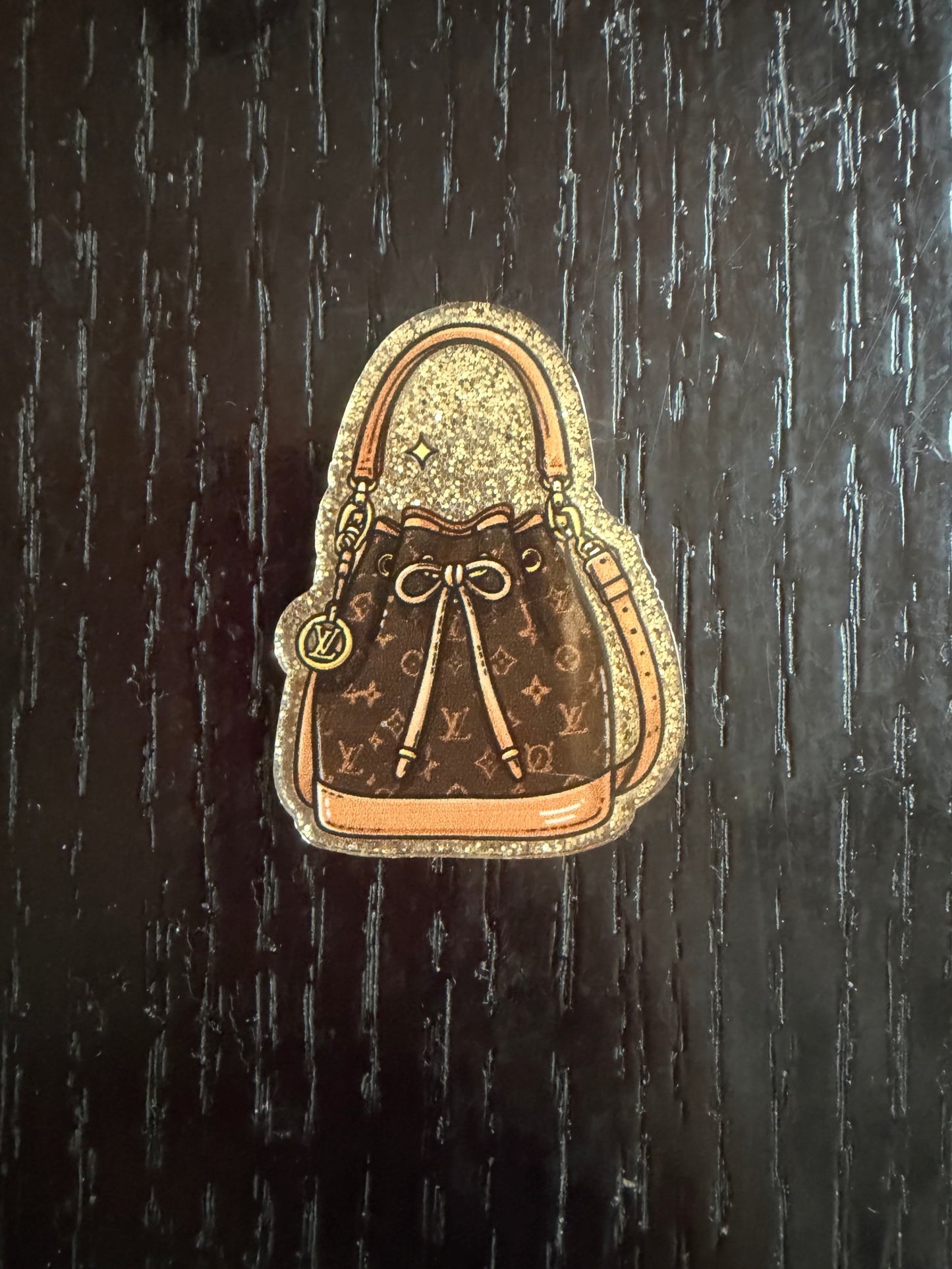 LV bag badge reel
