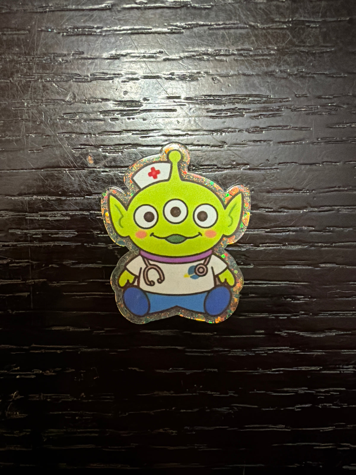 Toy Story Alien nurse badge reel