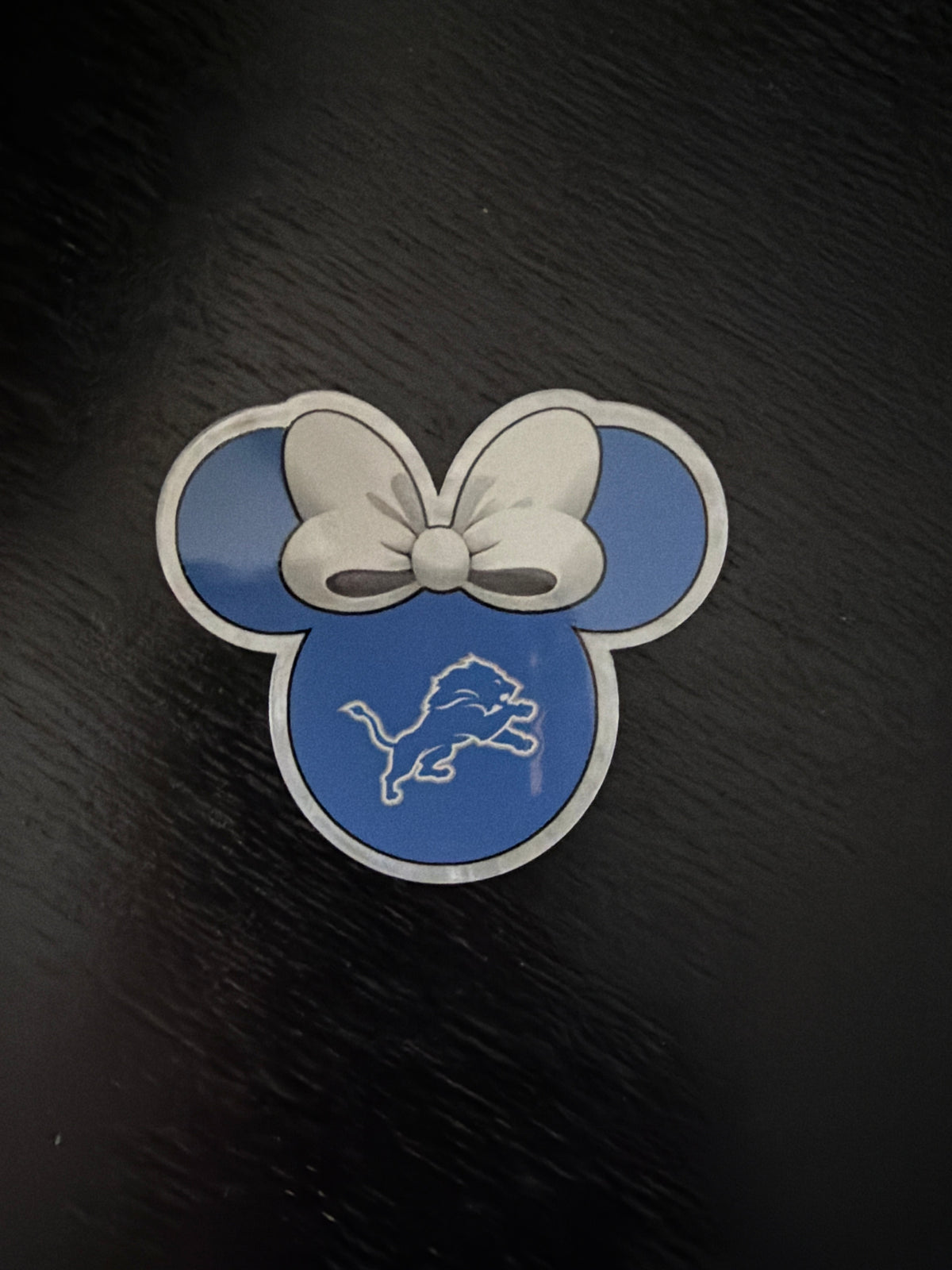 Lions badge reel