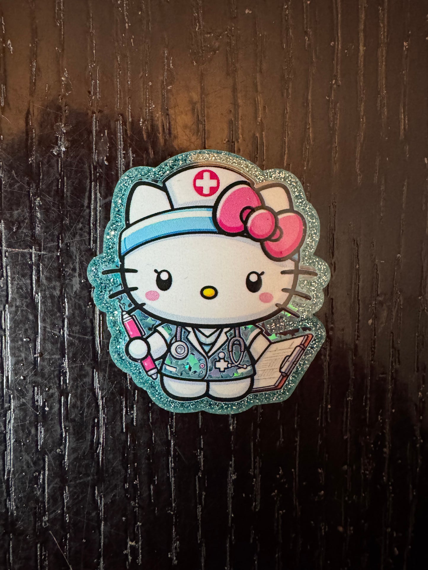 Hello Kitty Nurse shaker badge reel