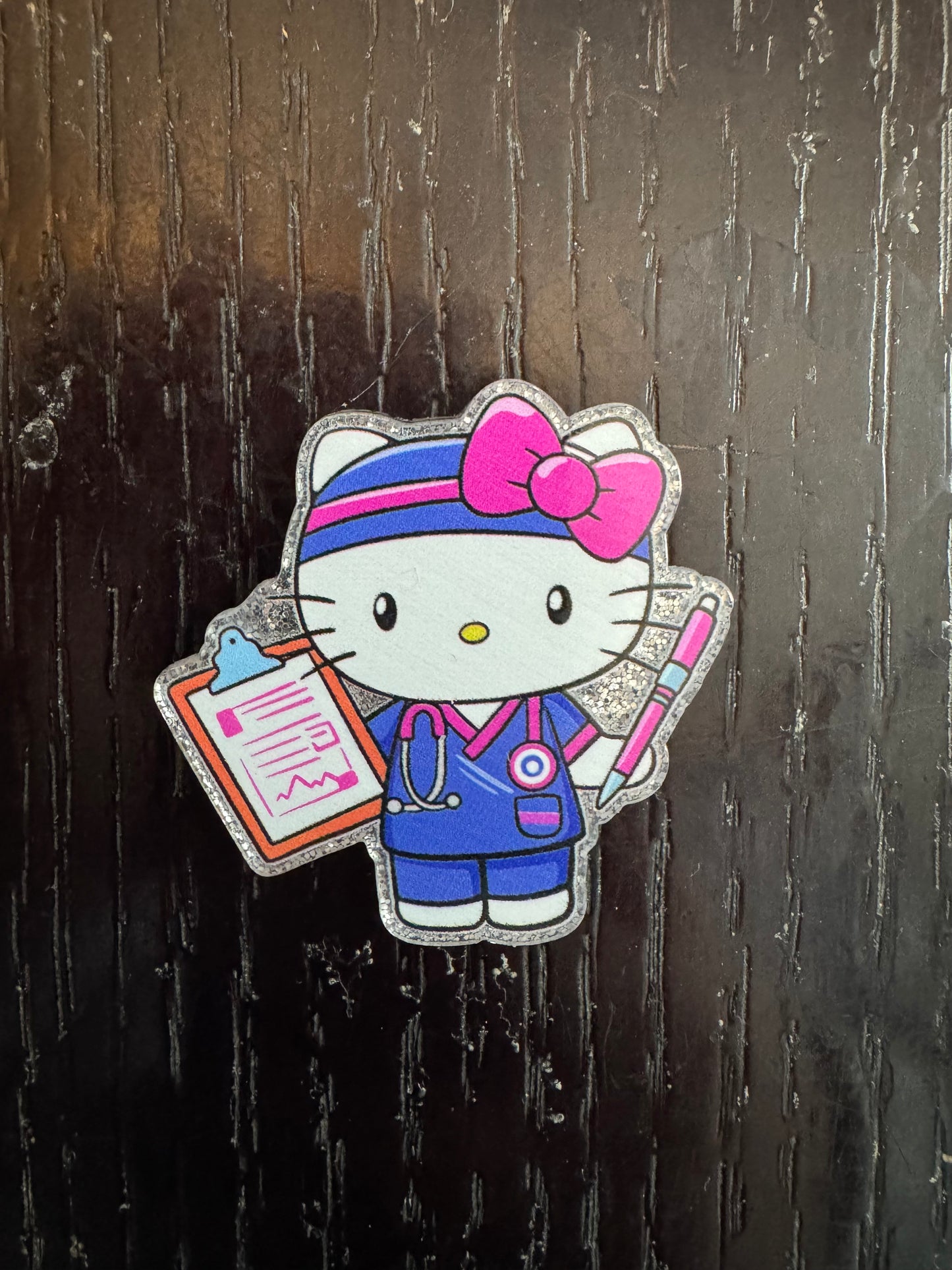 Hello kitty nurse badge reel
