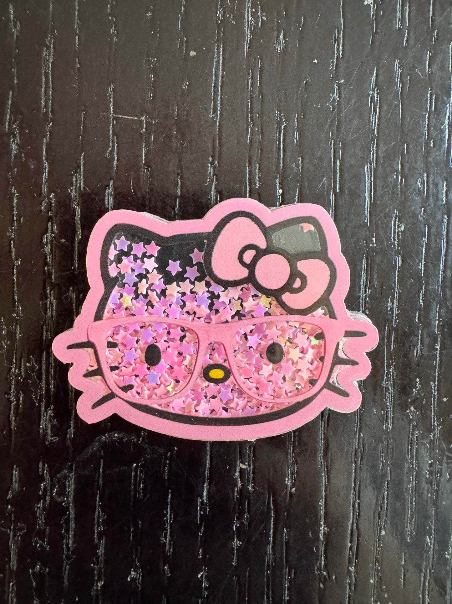 Hello Kitty shaker badge reel