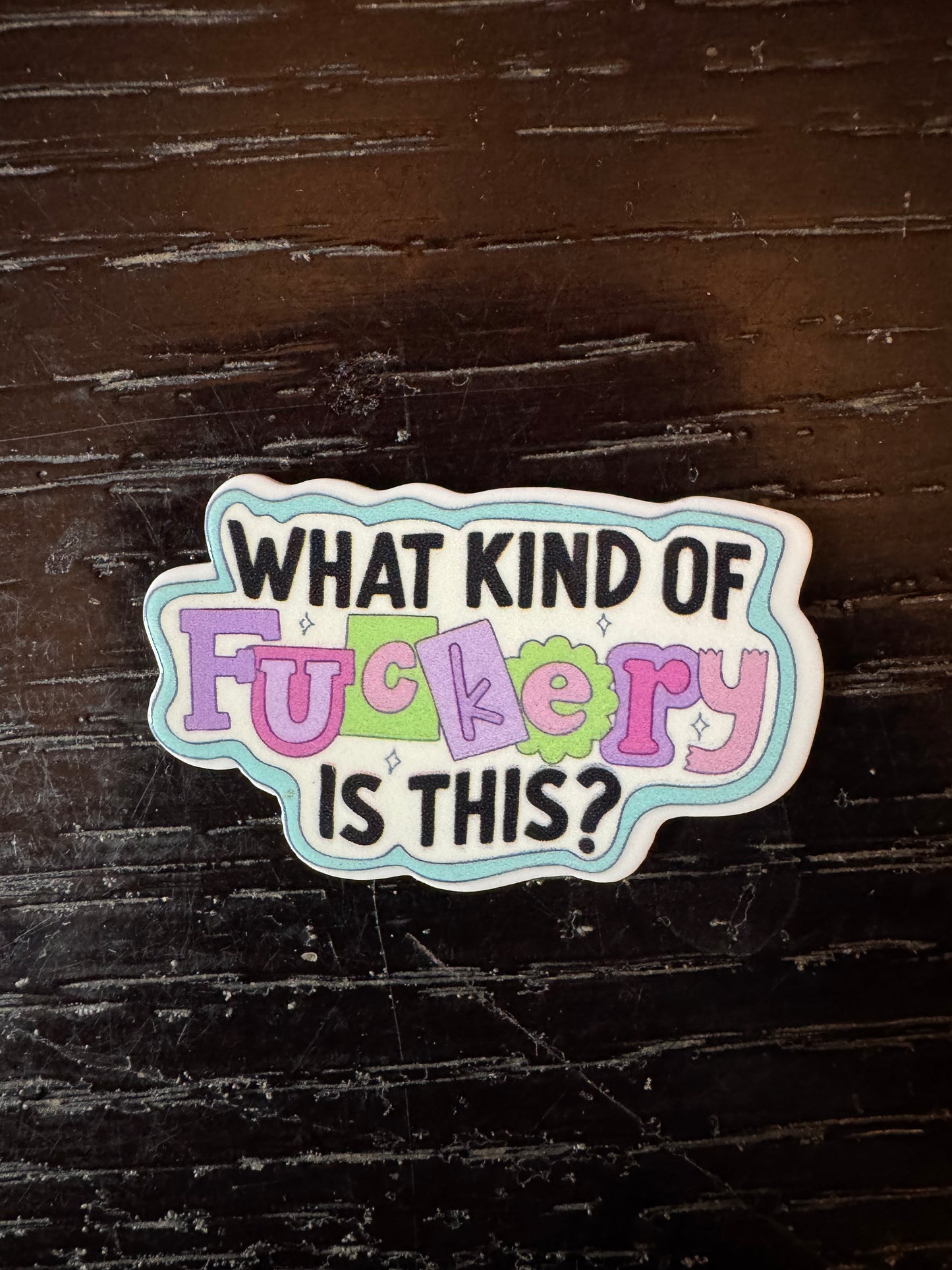 What kind of fuckery is this badge reel
