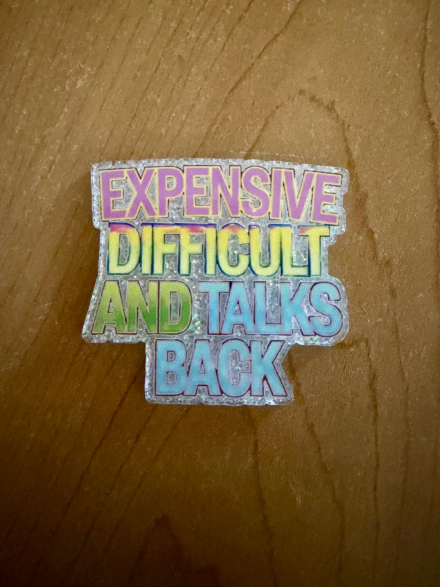 Expensive, Difficult and talks back badge reel