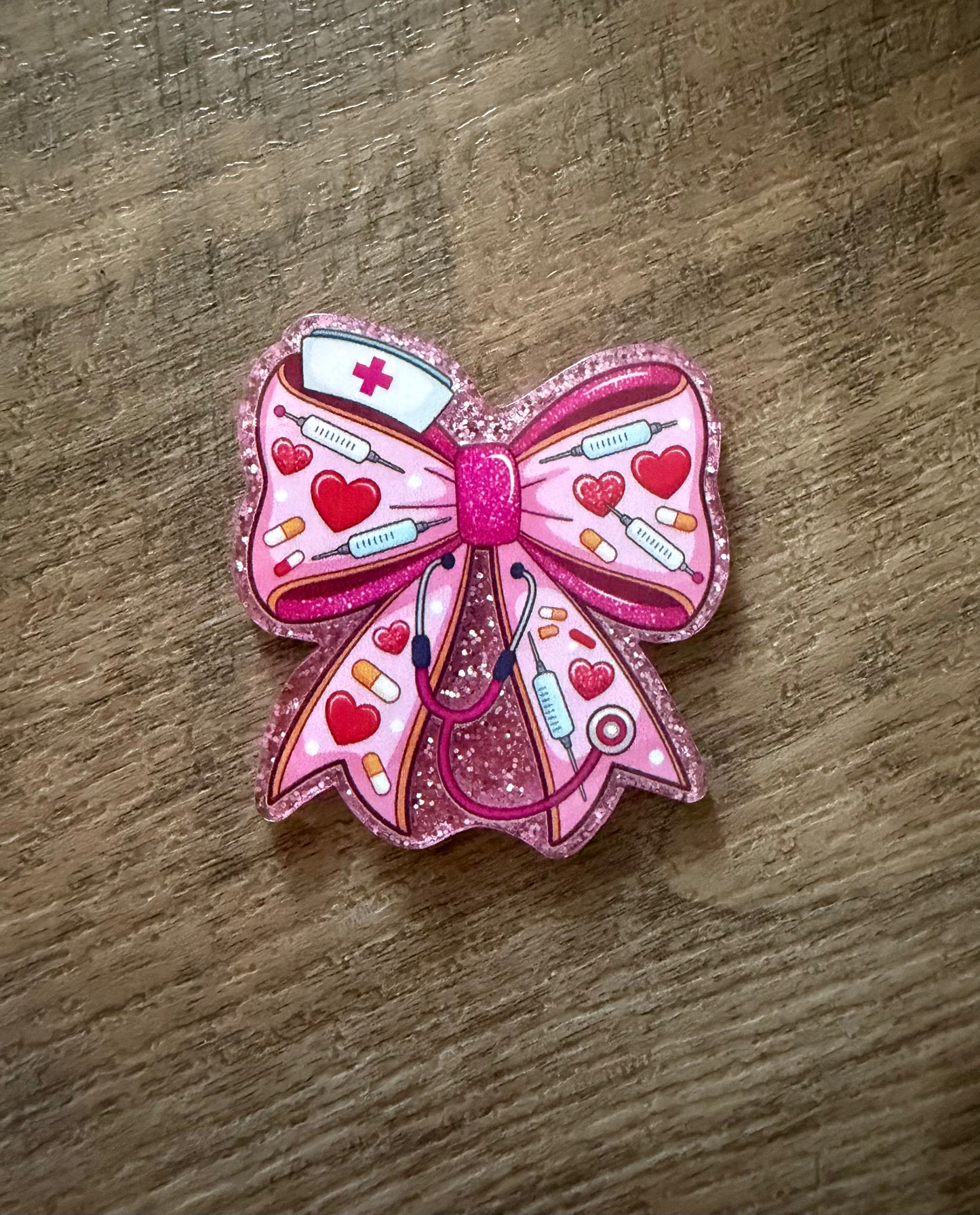 Medical bow badge reel