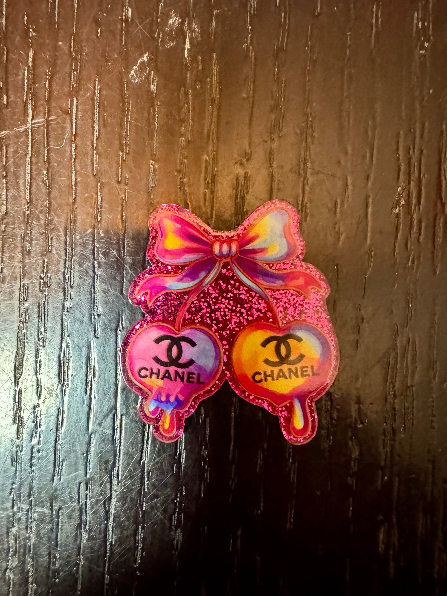 Chanel cherries badge reel