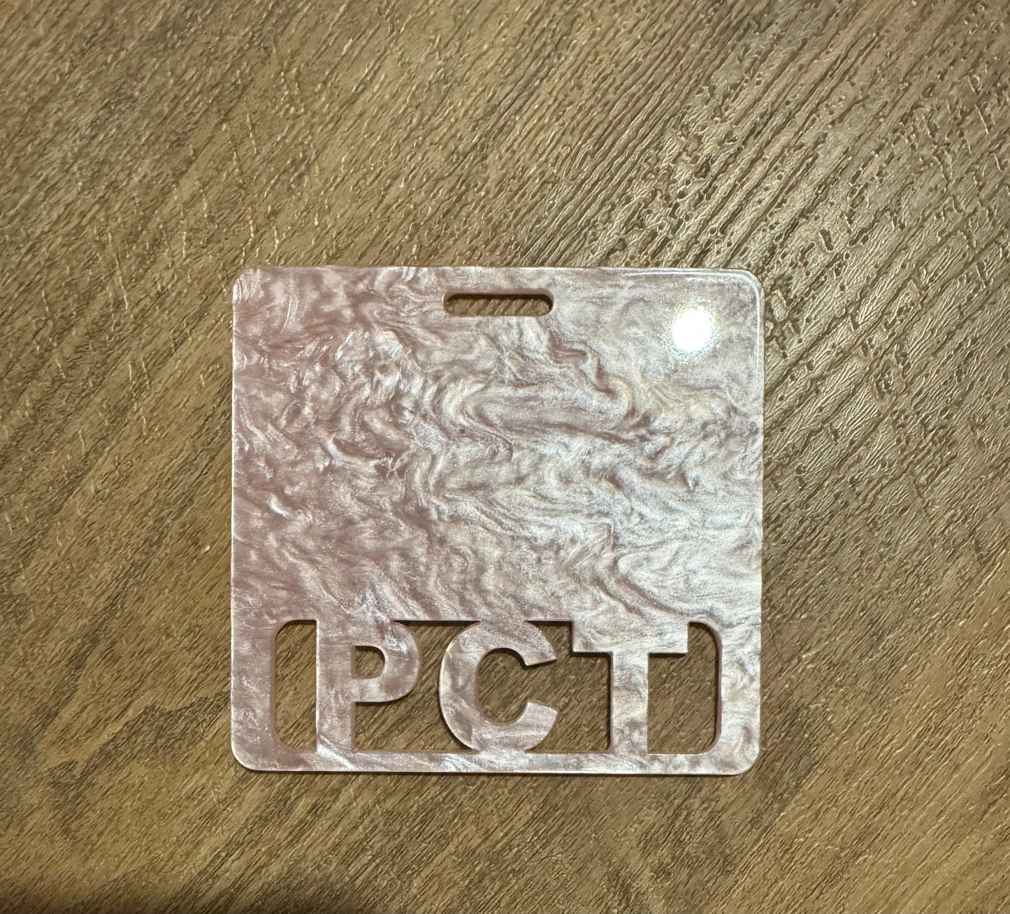 PCT pink marble badge buddy