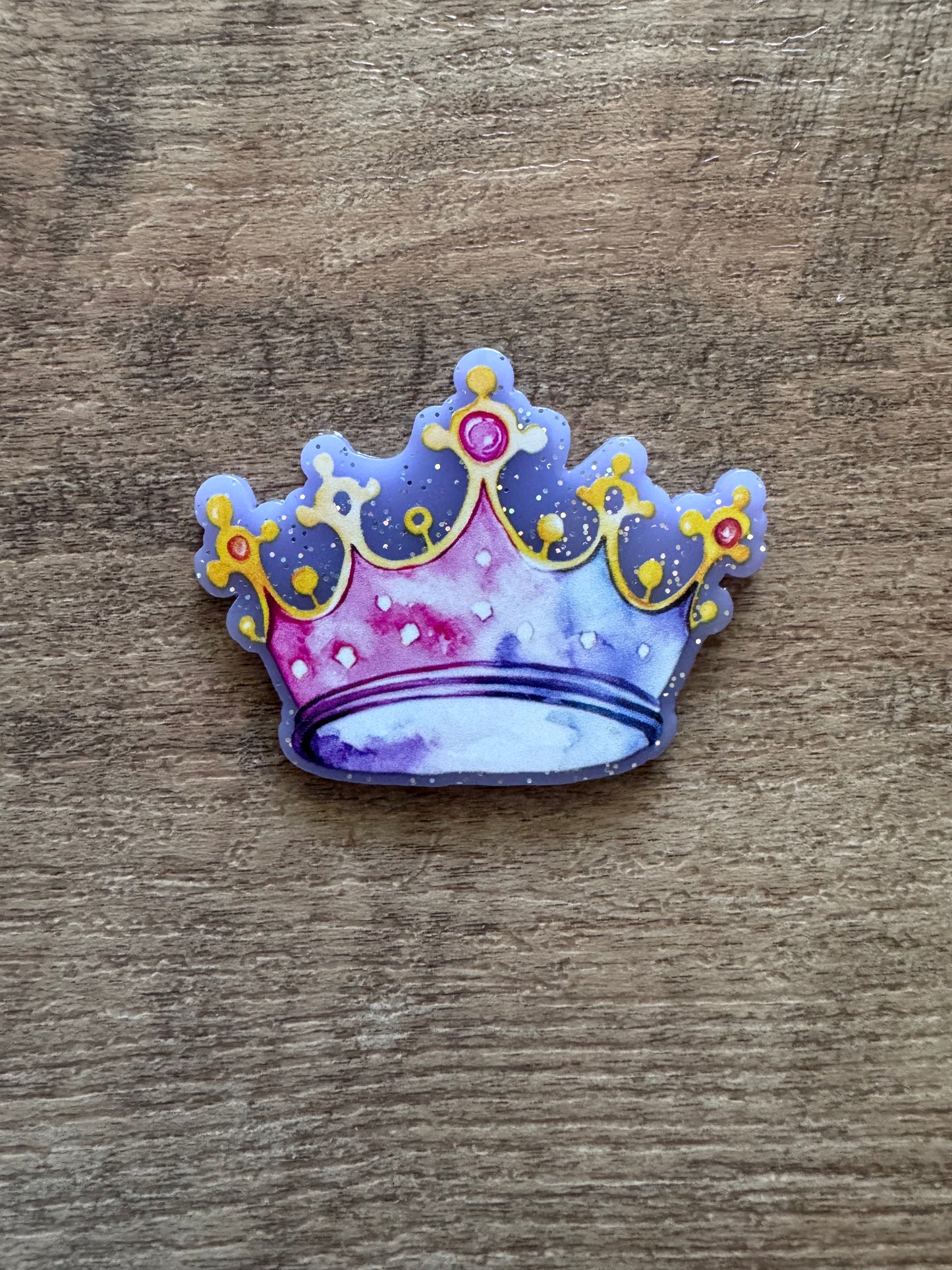 Crown badge reel