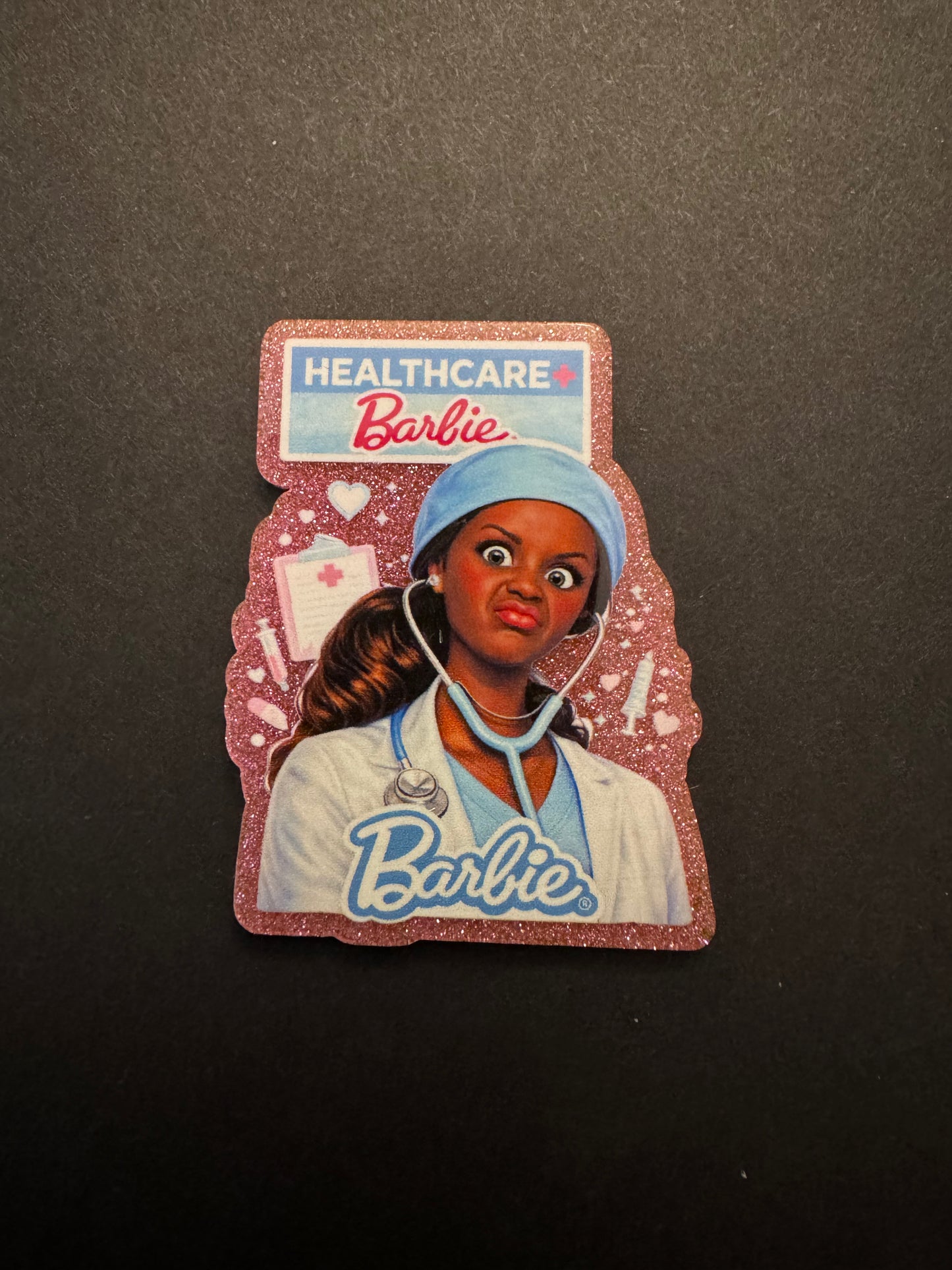 Barbie badge reel