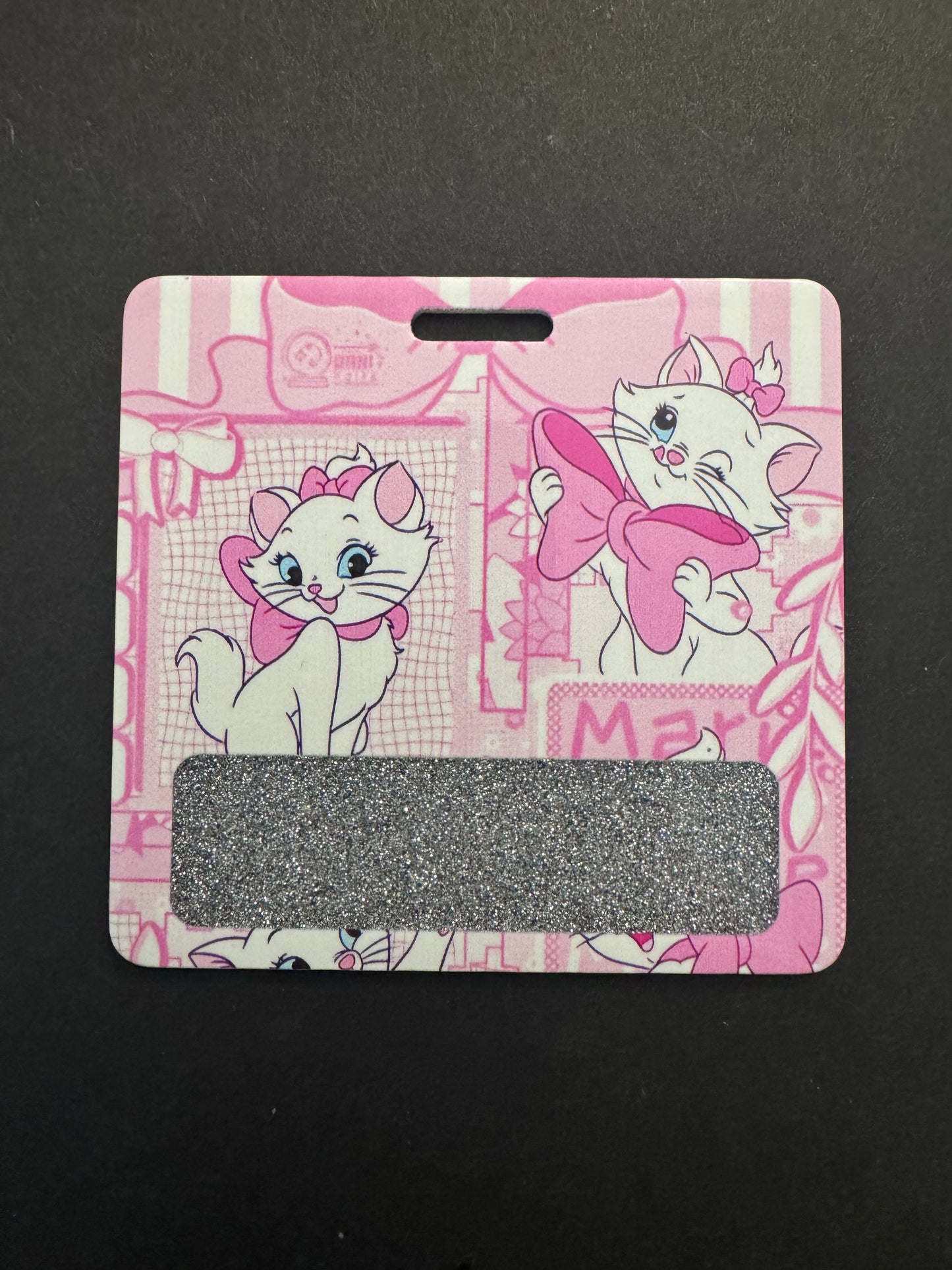 Marie cat badge buddy