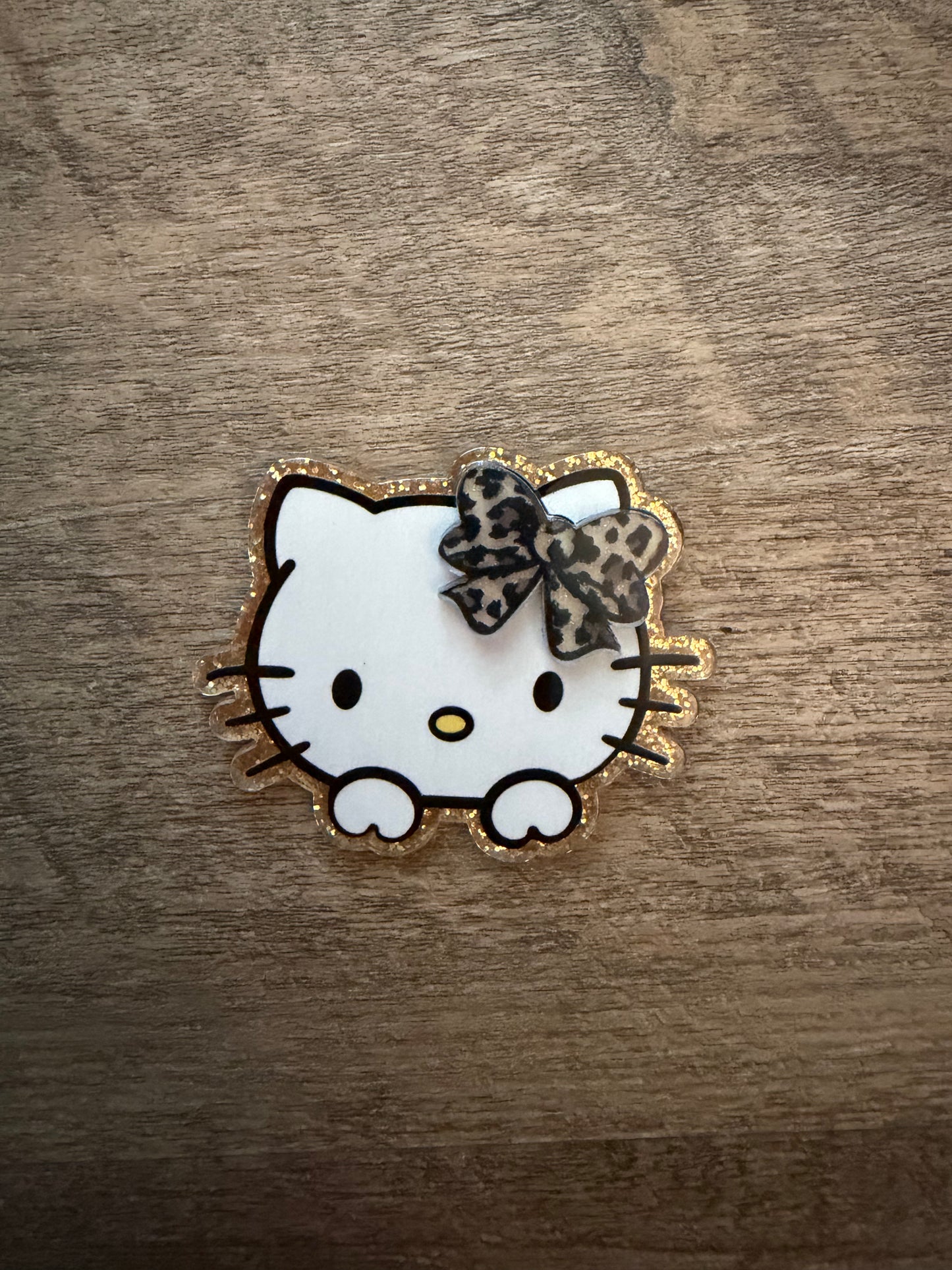 Hello Kitty with 3D bow badge reel