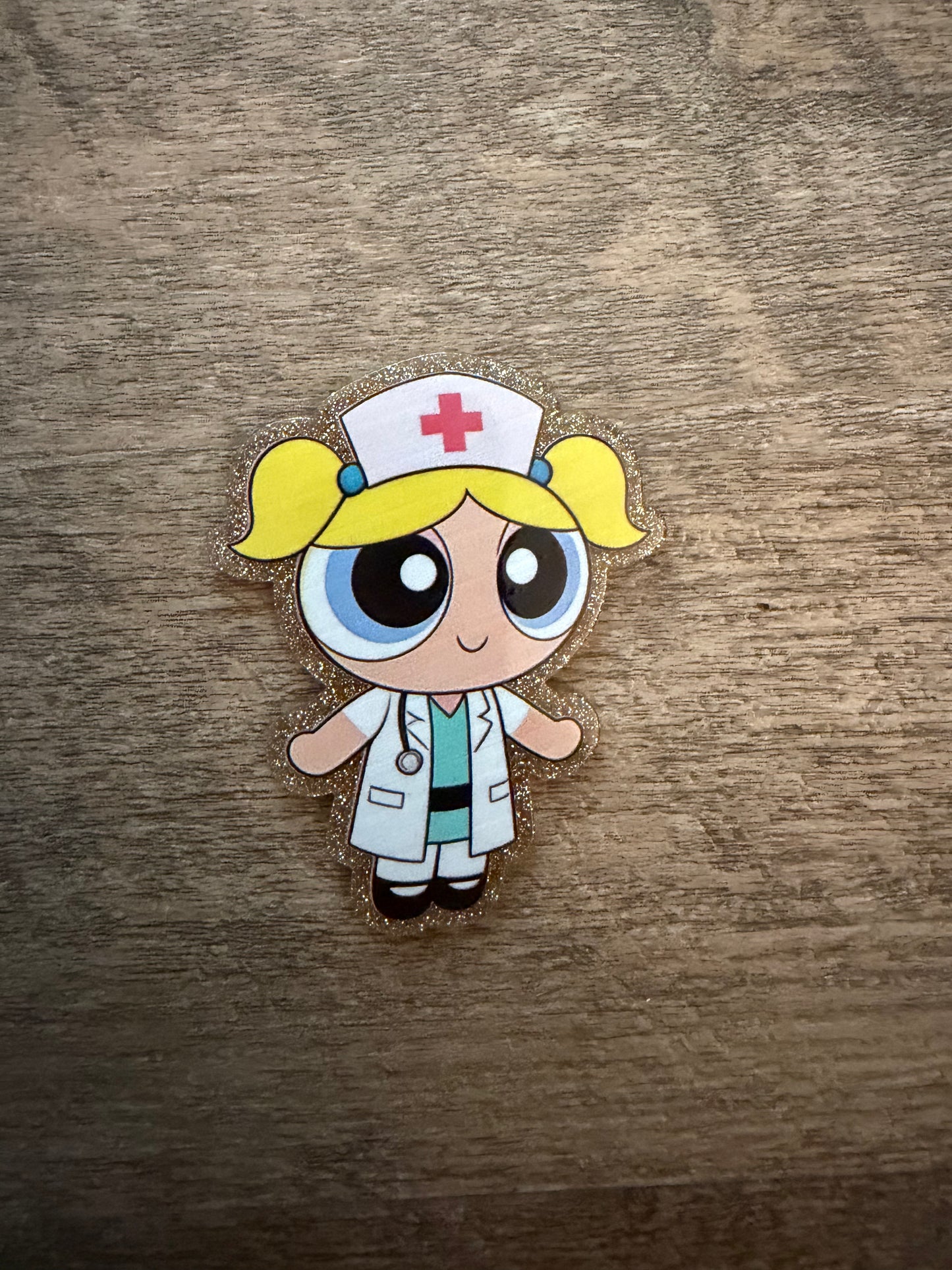 PPG nurse Bubbles badge reel