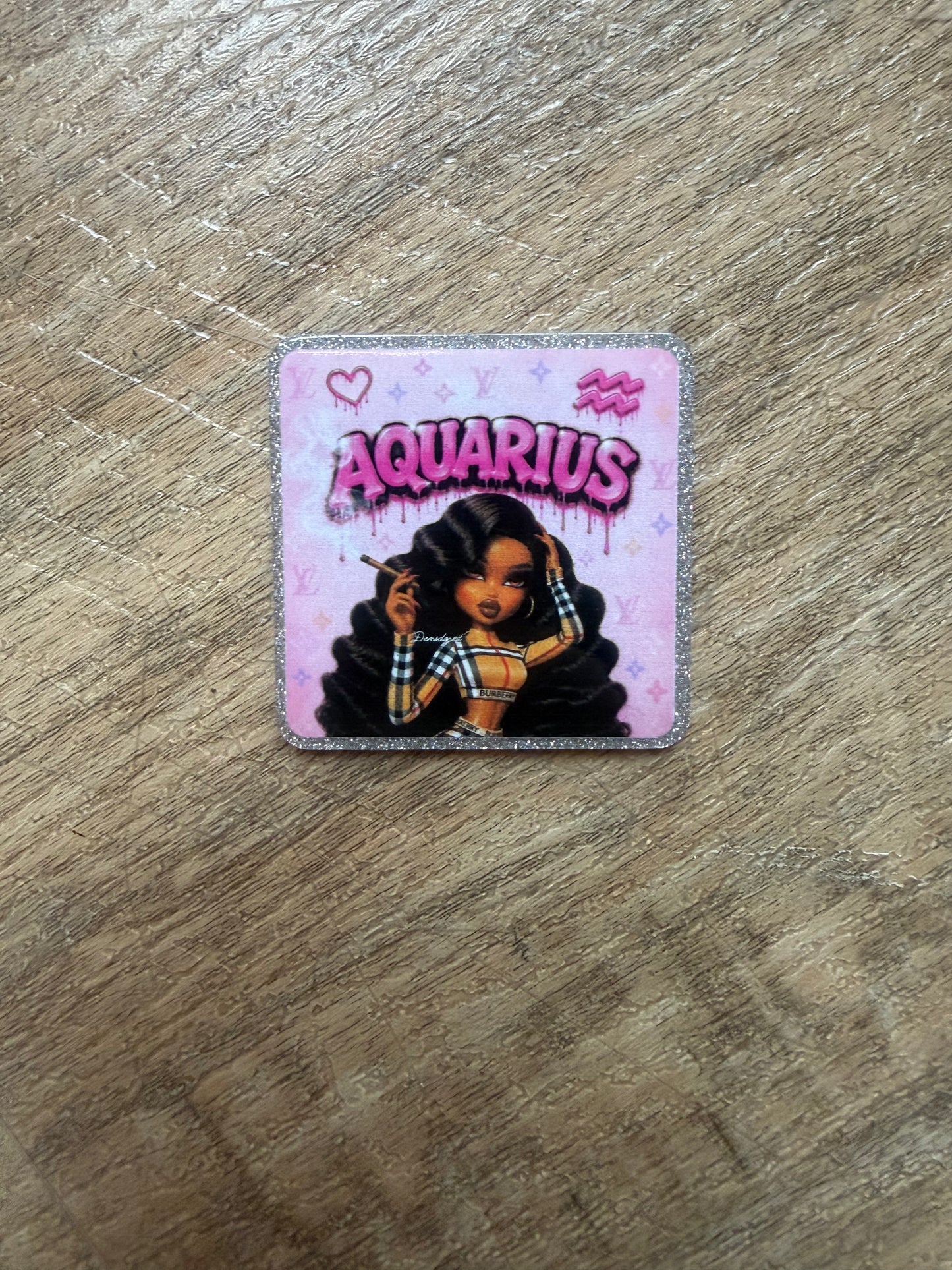 Aquarius badge reel