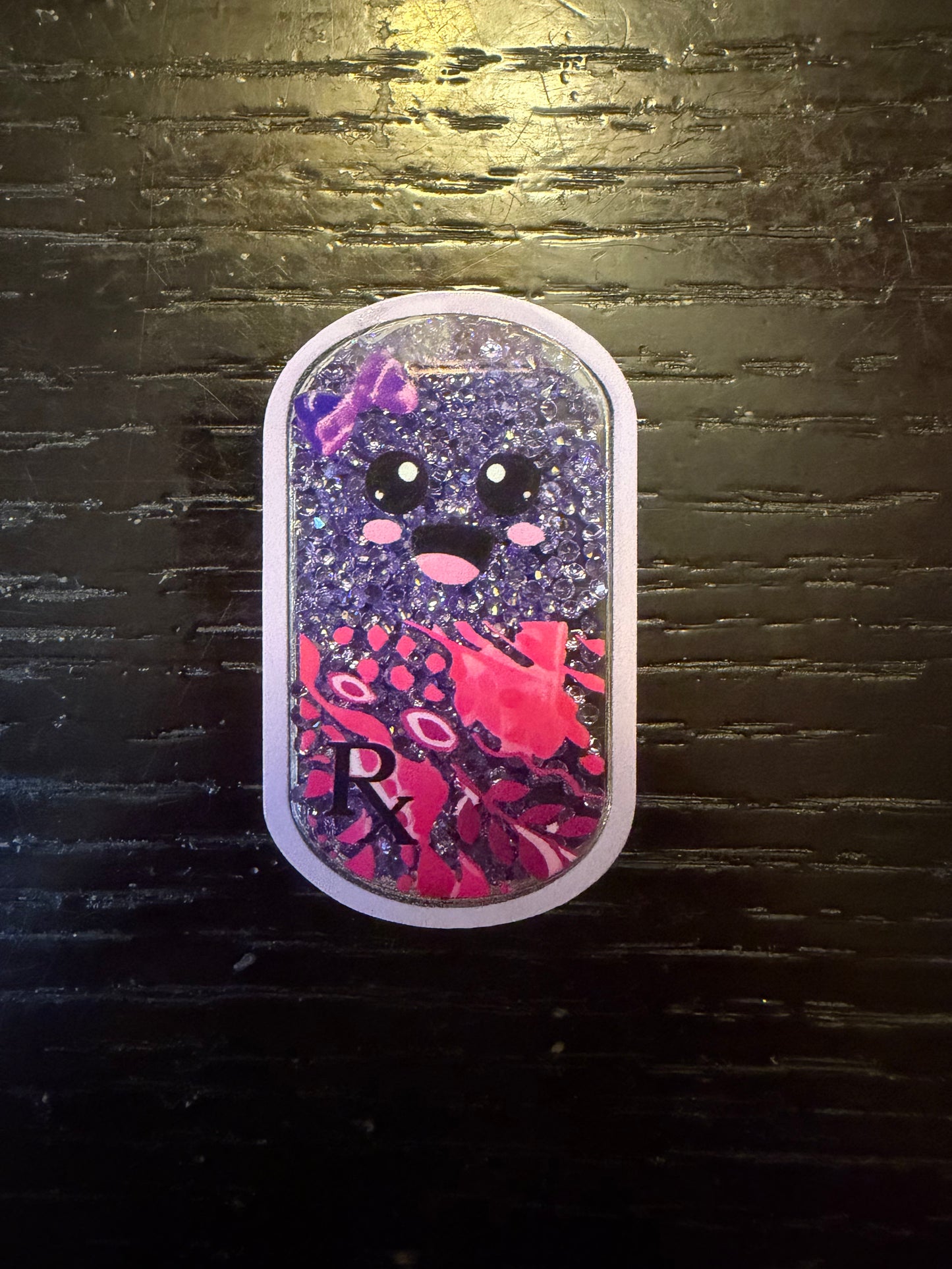 Pill shaker badge reel