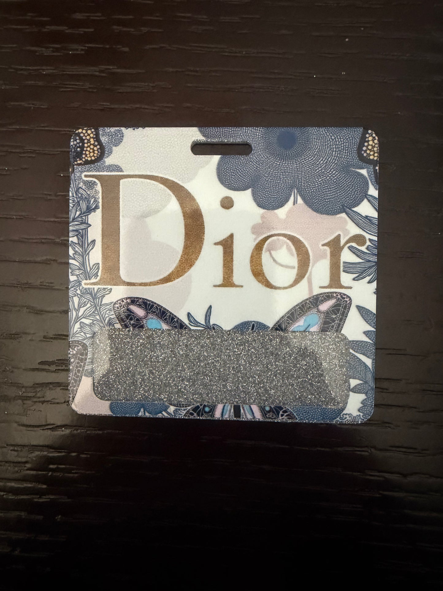 Dior badge buddy
