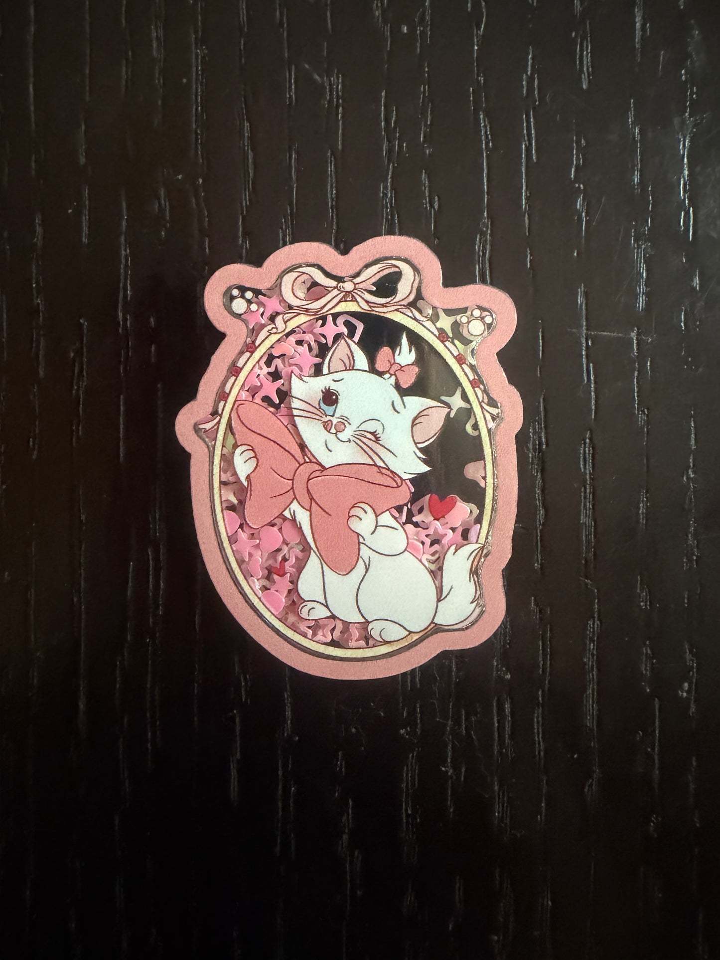 Marie cat shaker badge reel