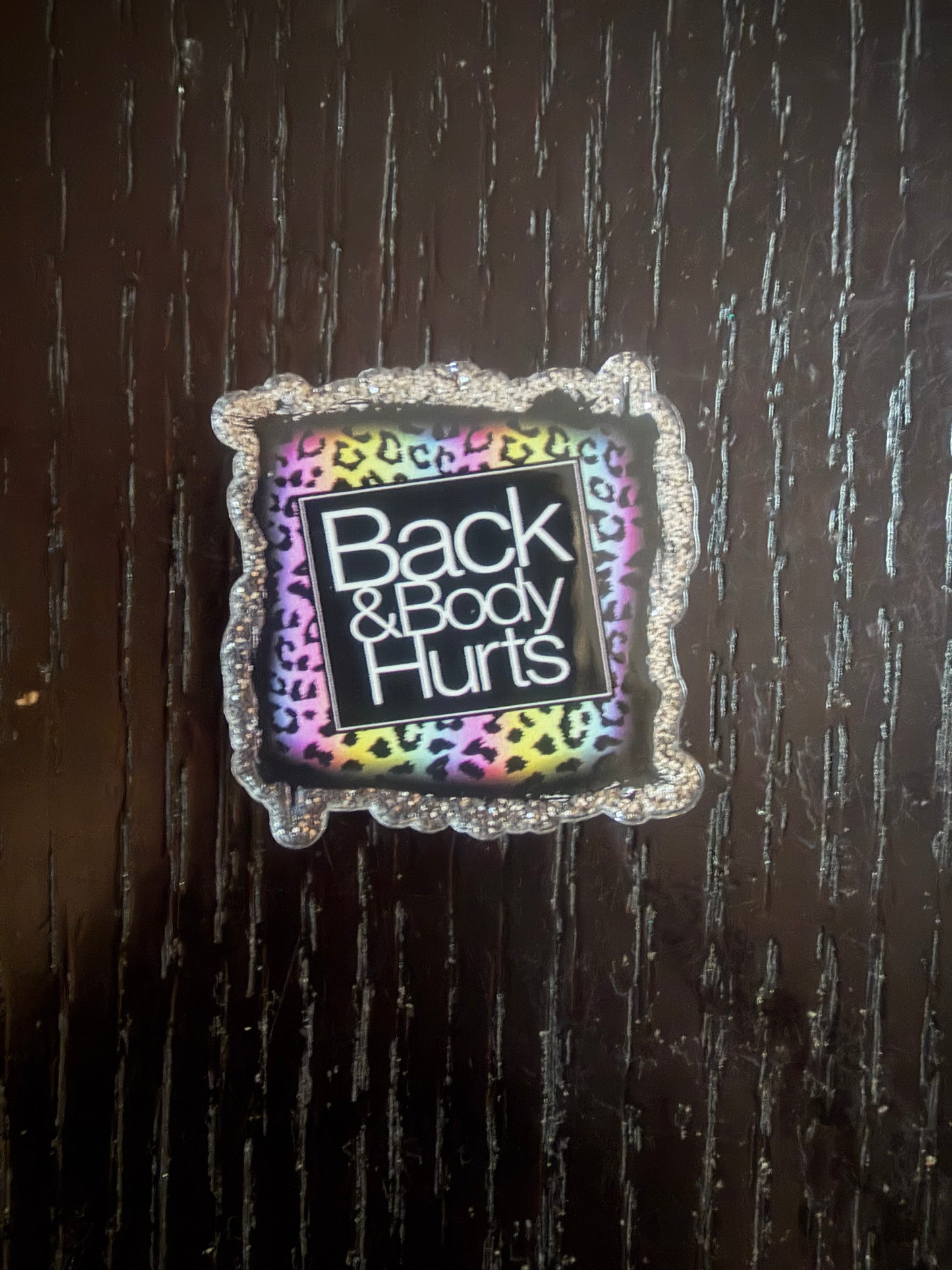 Back & Body hurts badge reel