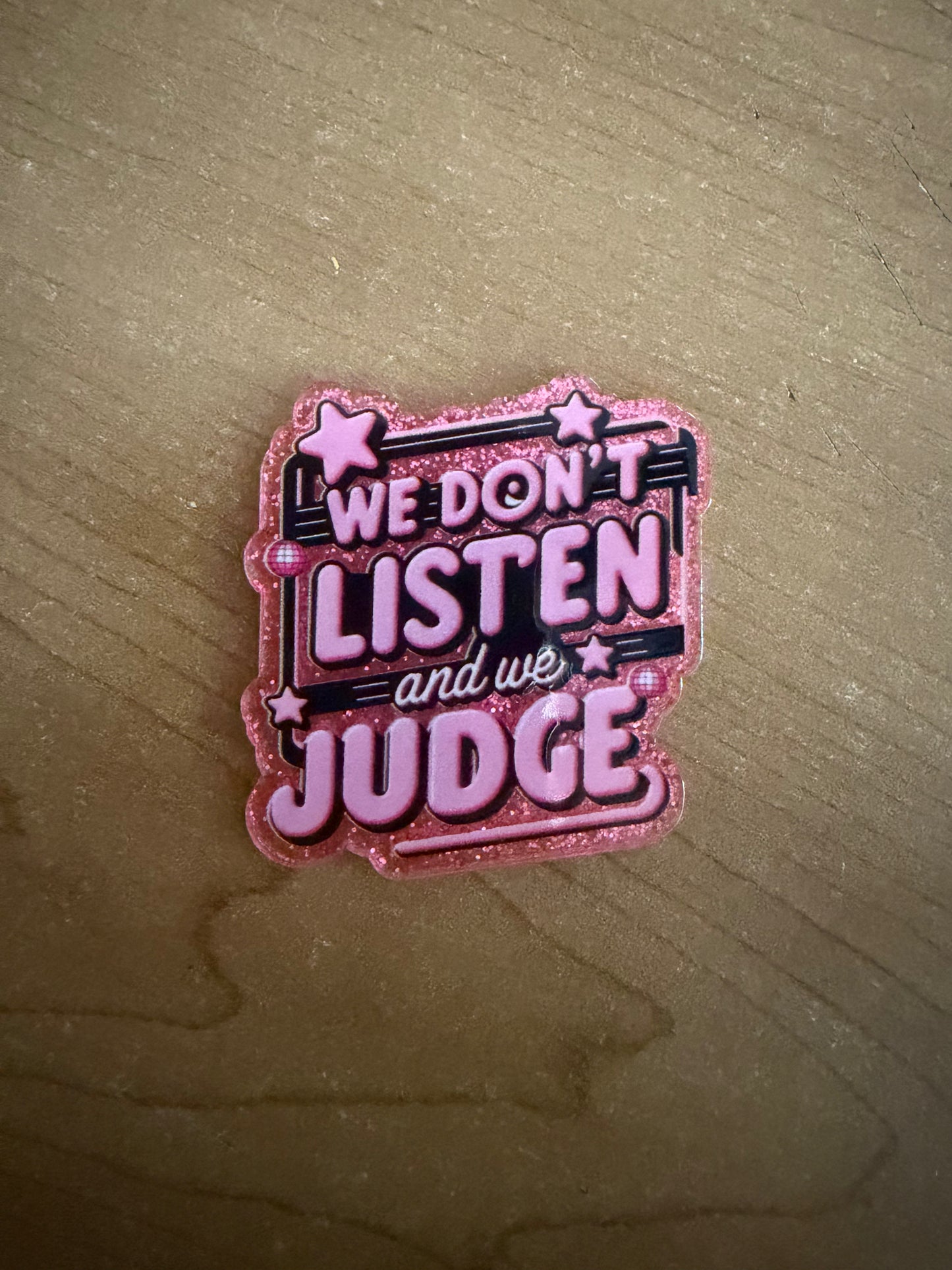 We don’t listen and we judge badge reel