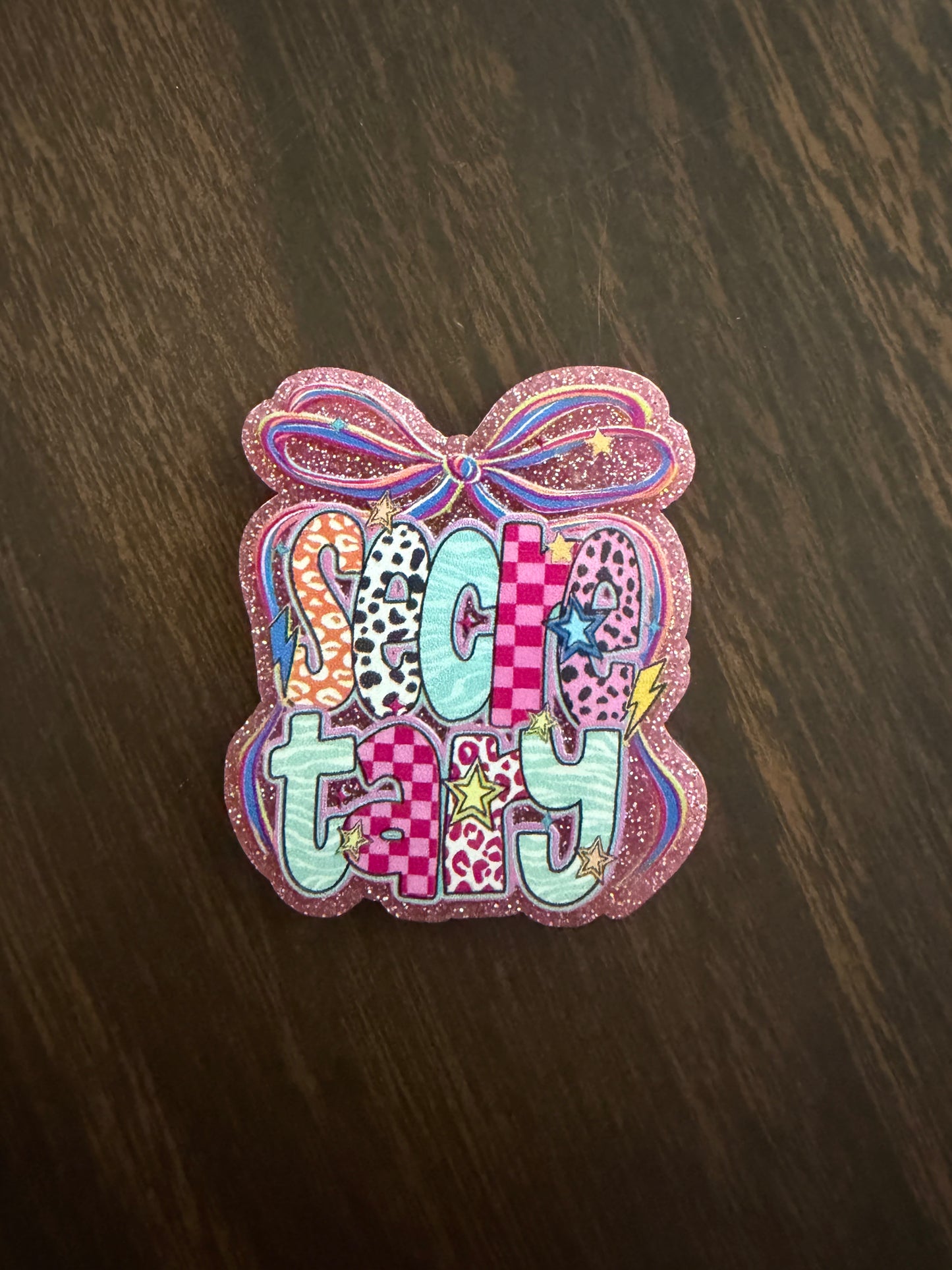 Secretary badge reel