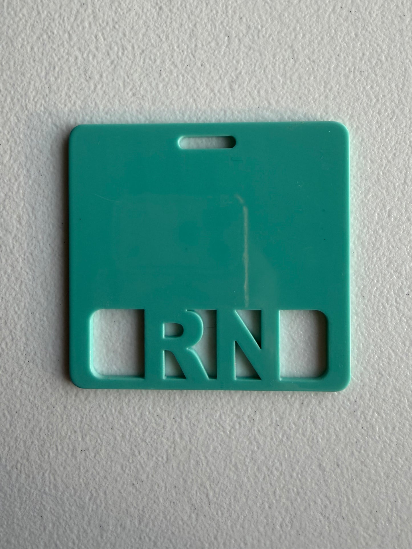 RN badge buddy (solid teal)