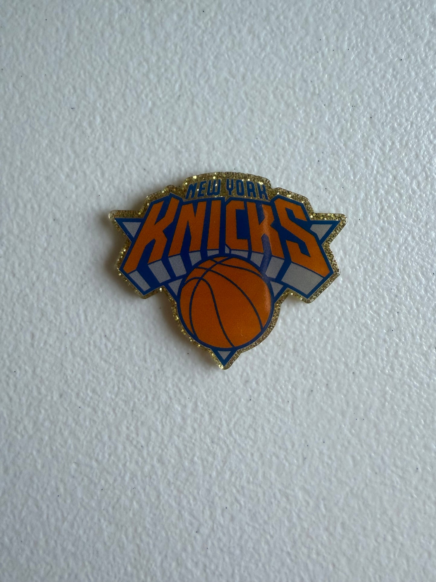 Knicks badge reel