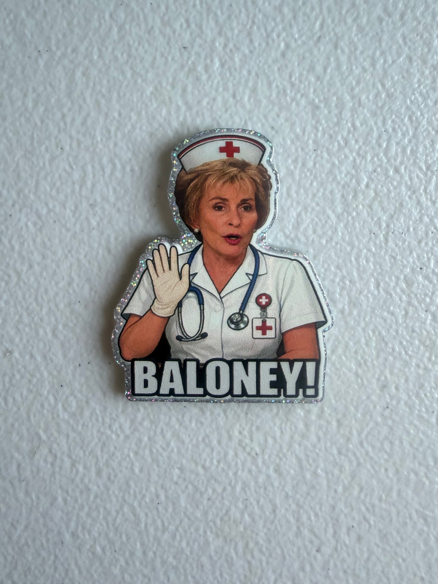 Judge Judy nurse badge reel