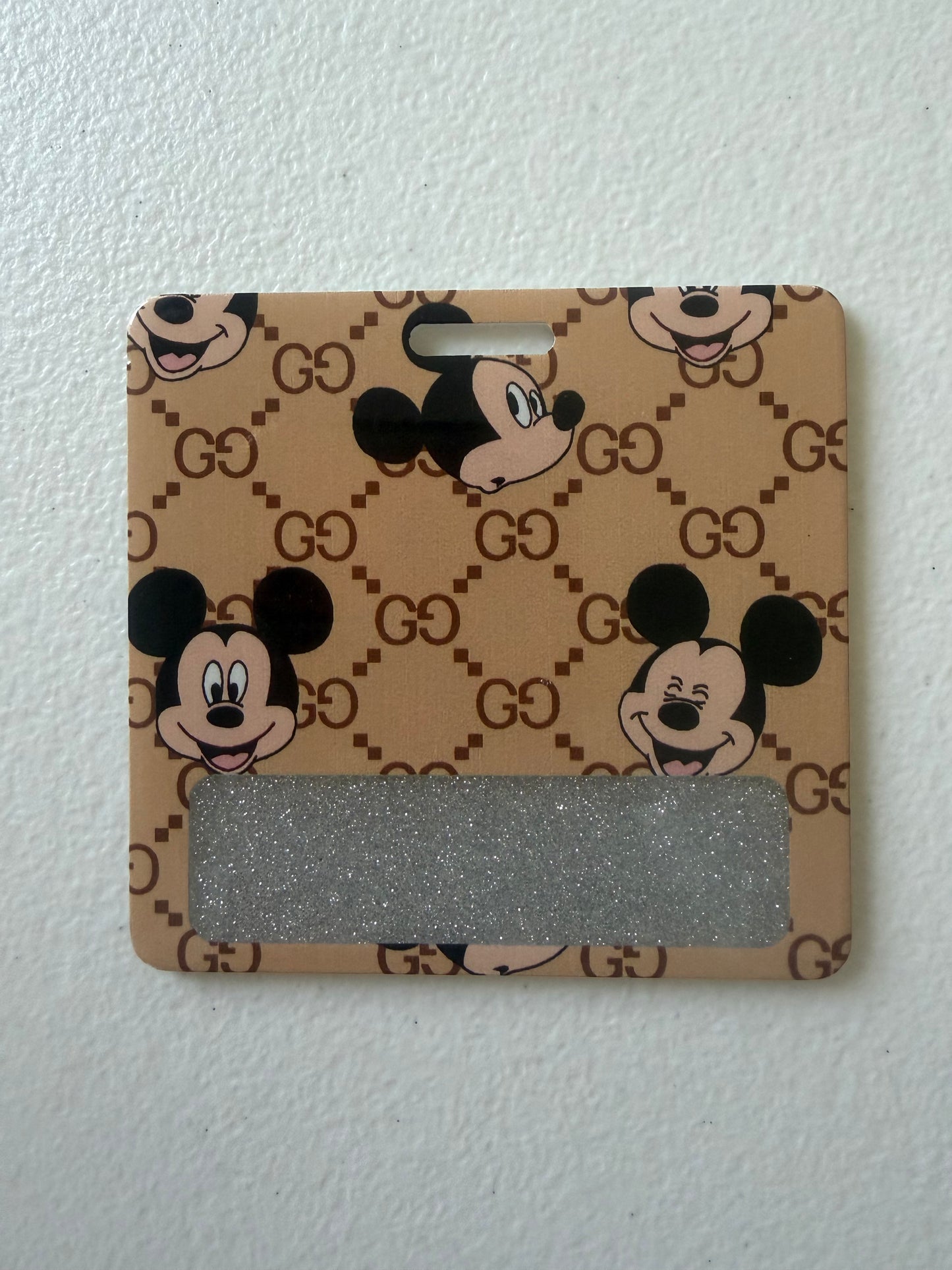 Mickey Gucci badge buddy