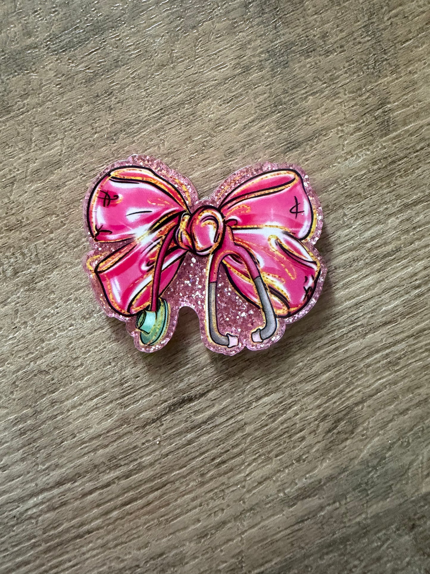 Medical bow badge reel
