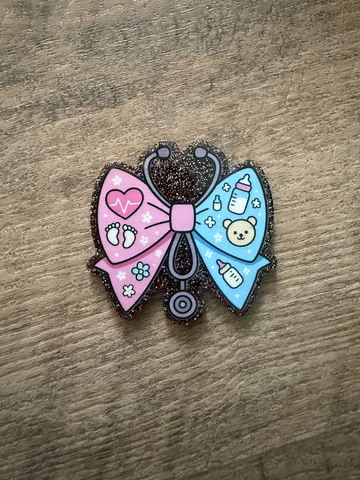 Baby medical bow badge reel