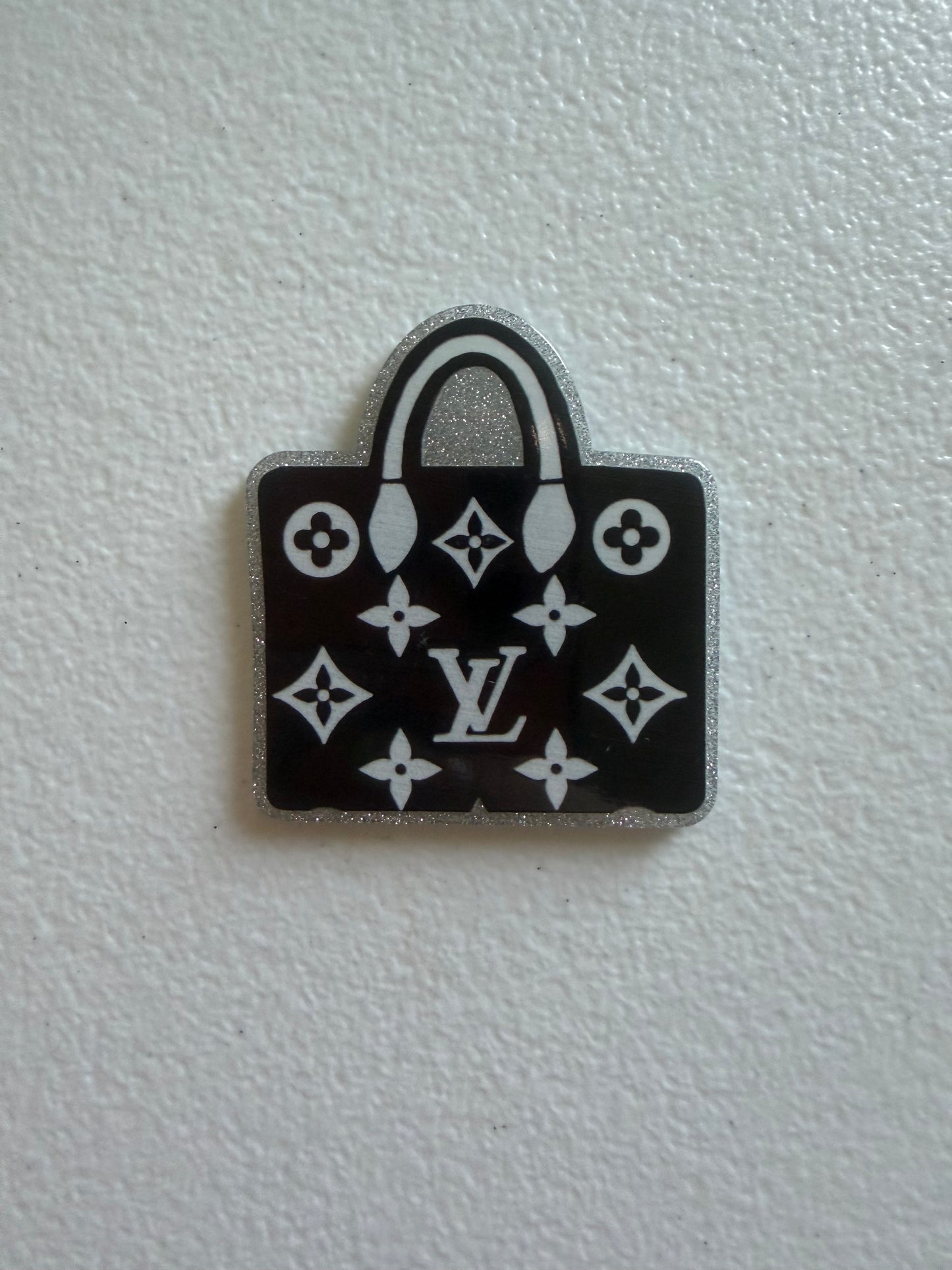 LV bag badge reel