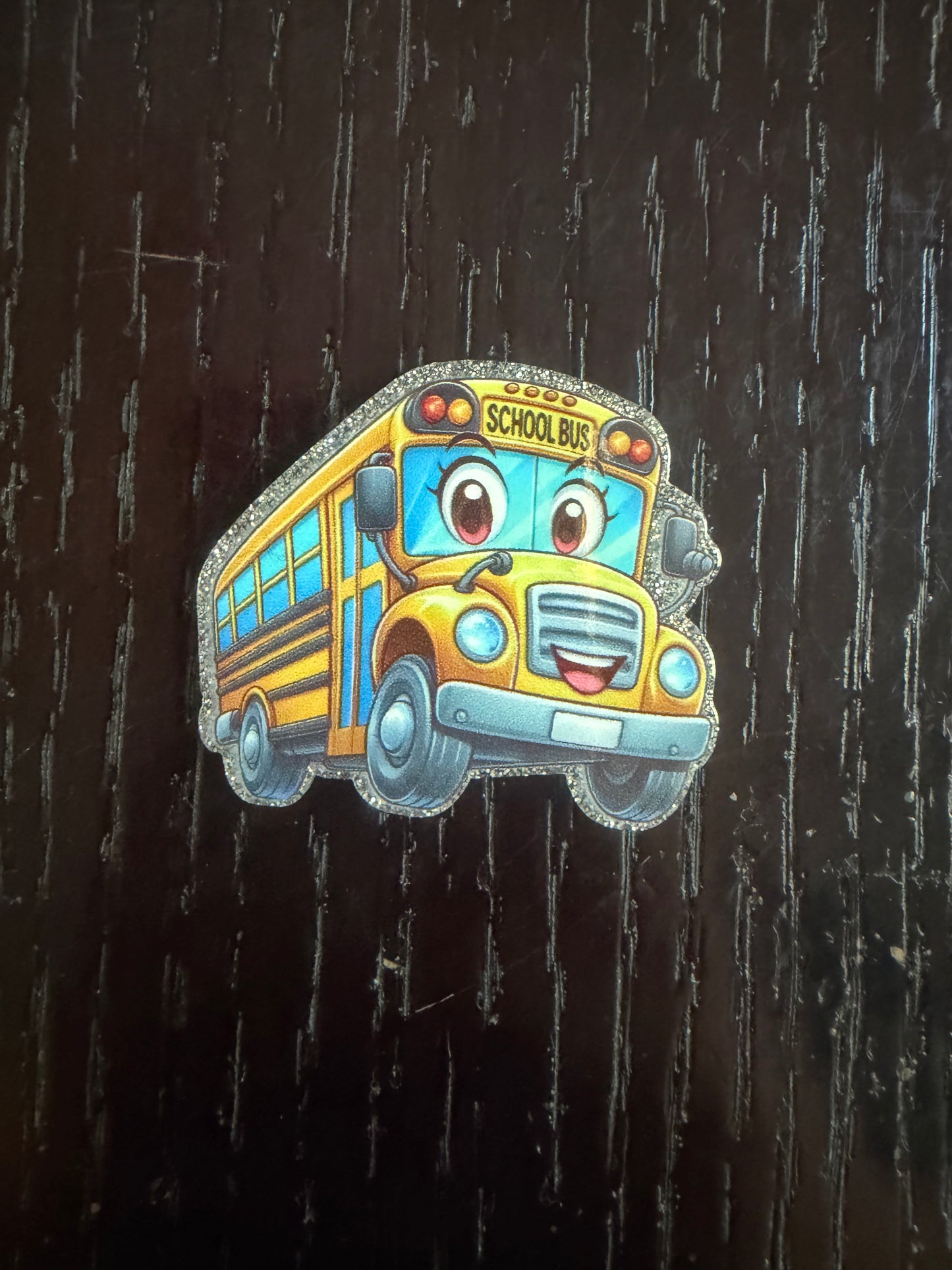 School bus badge reel