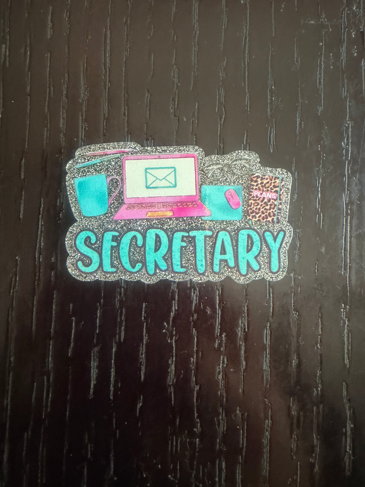 Secretary badge reel