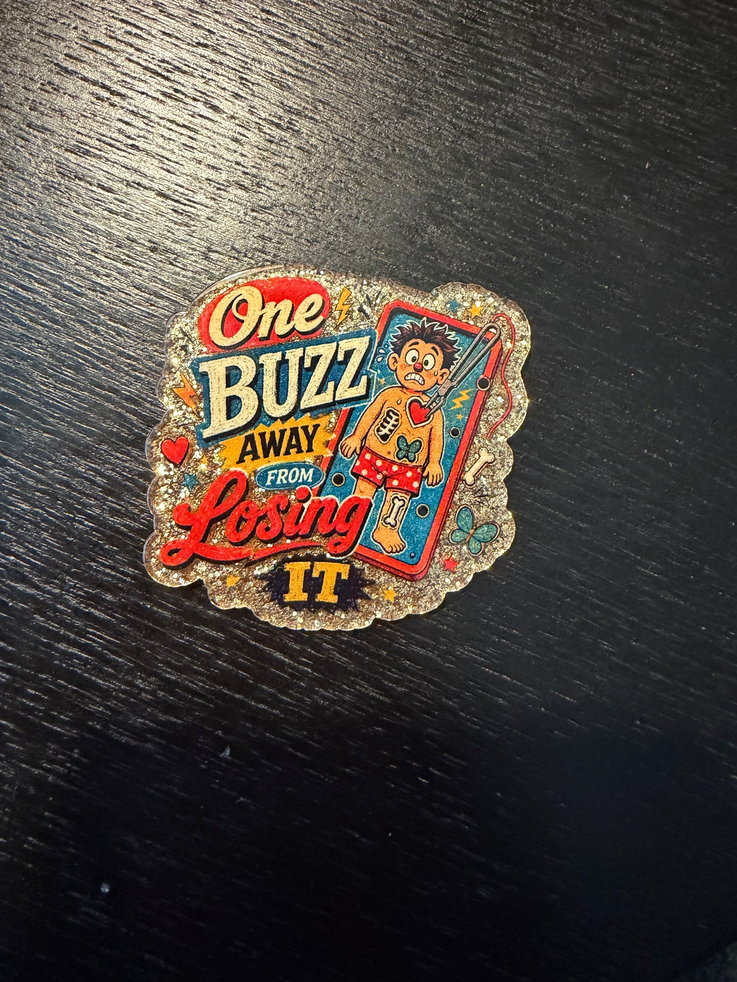 One buzz away from losing it badge reel
