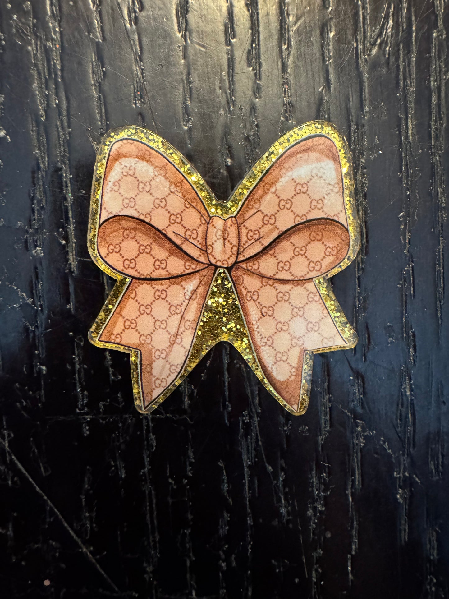 Bow badge reel