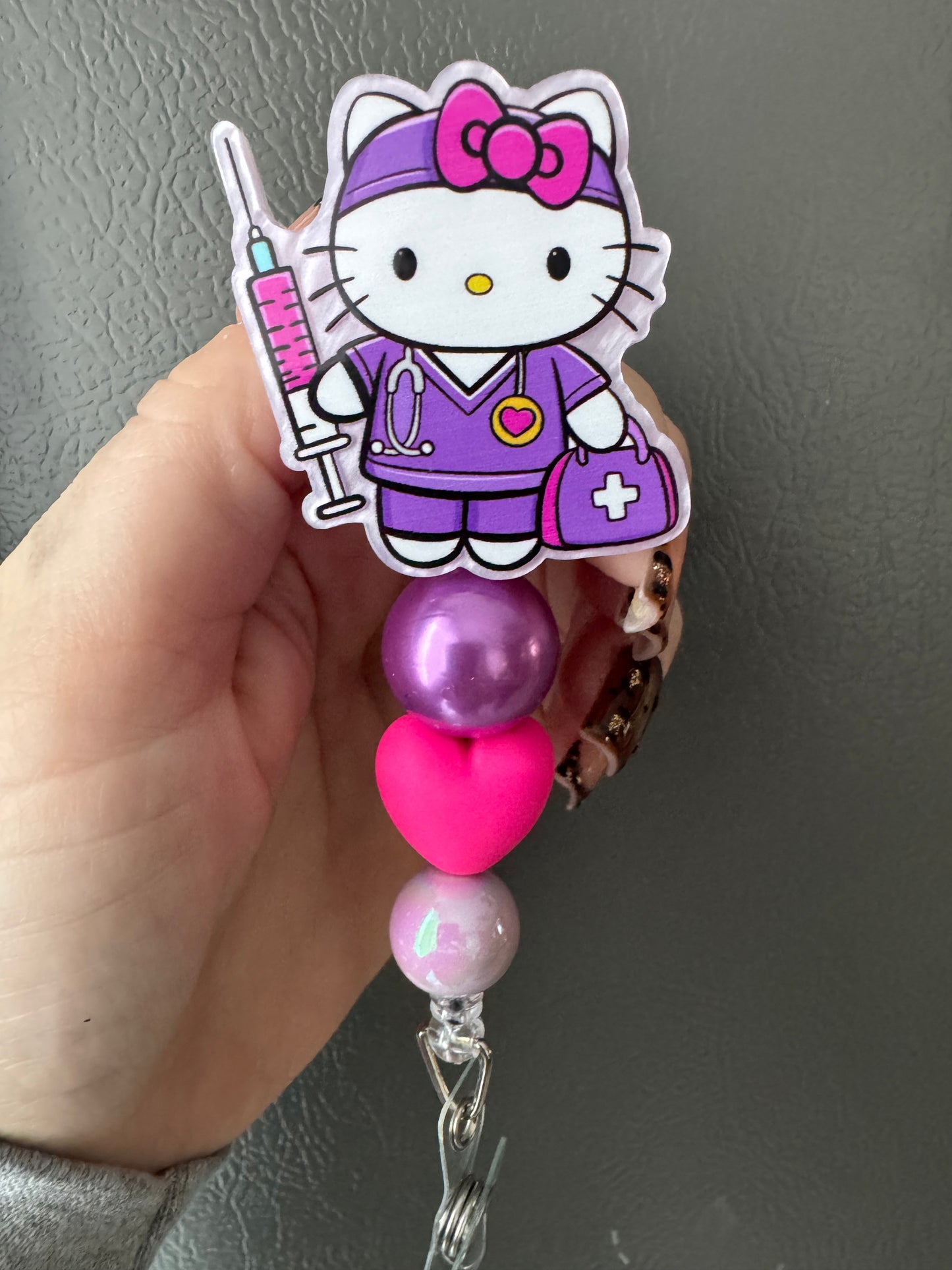 Hello Kitty nurse badge reel